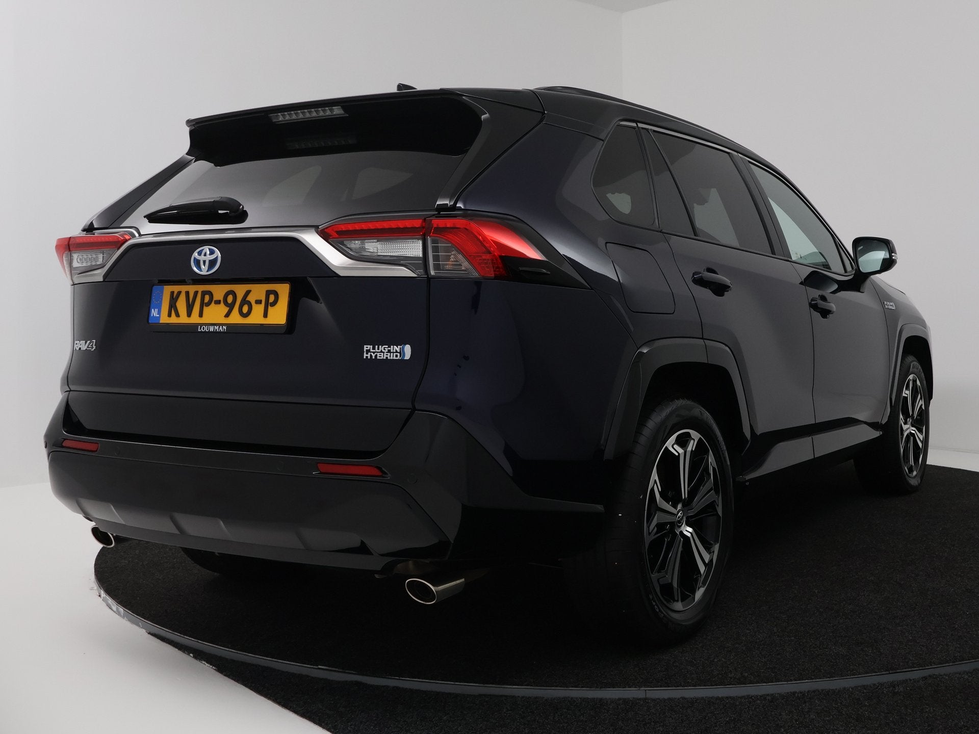 Toyota RAV4 2.5 Plug-in Hybrid AWD Bi-Tone Plus | Navigatie, Auto's, Automaat, 12 maanden, Gebruikt, 4 cilinders