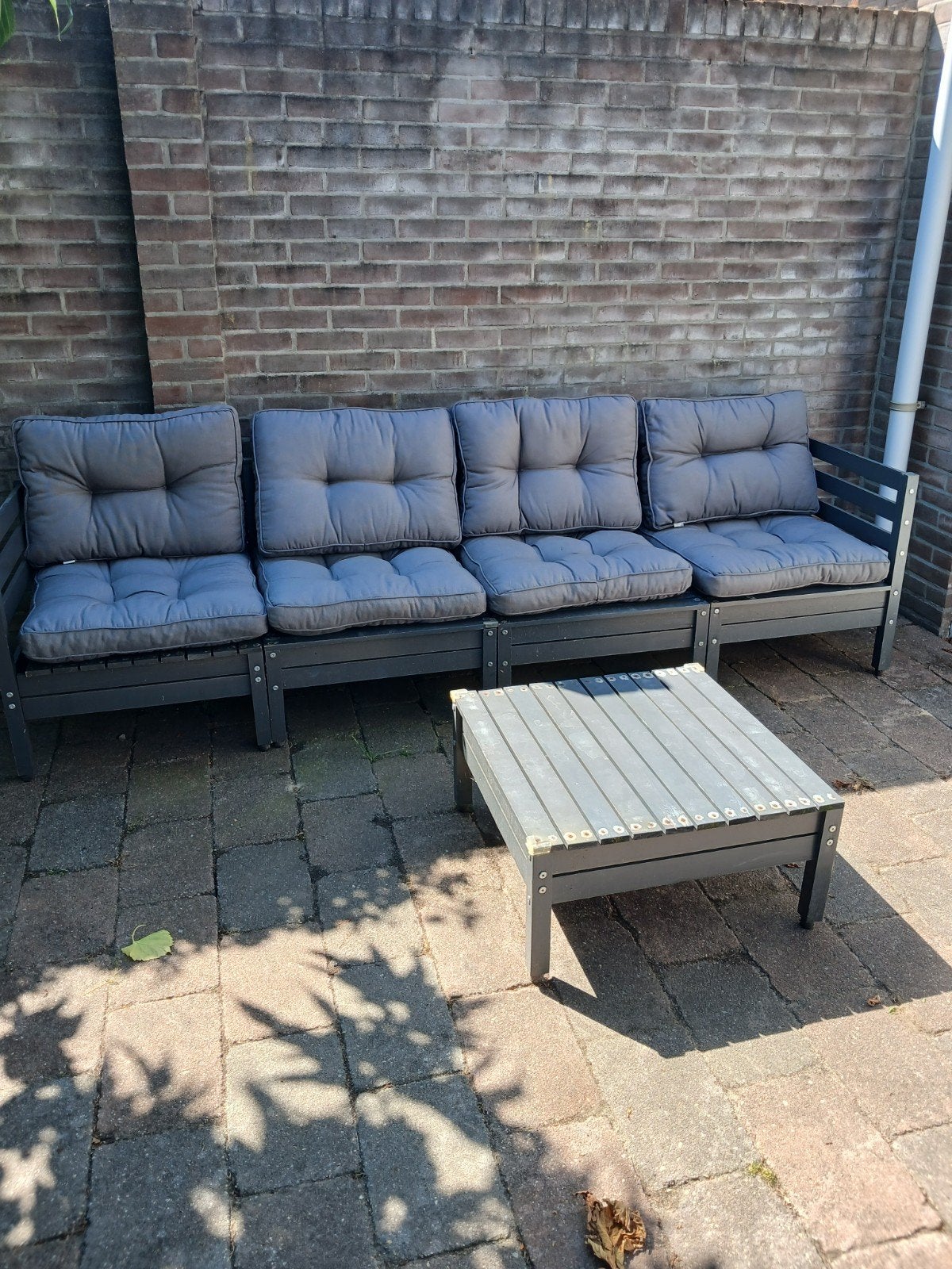 buiten bank met kussens, Ophalen