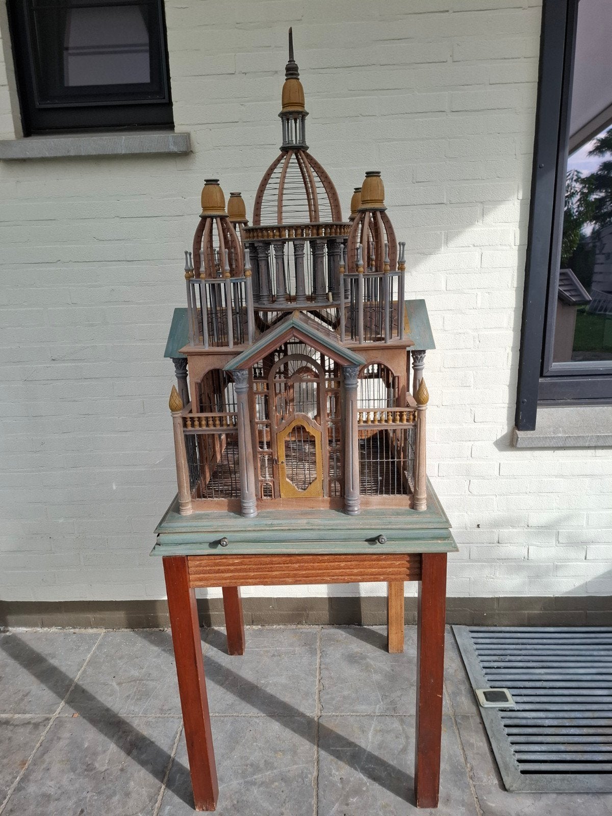 prachtige vogelkooi, Ophalen