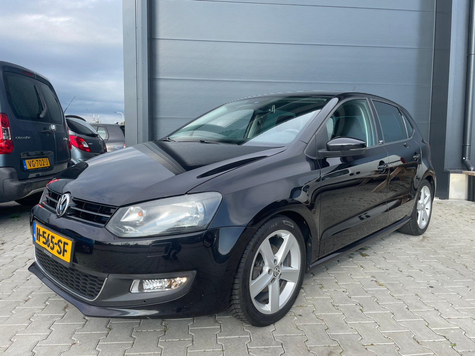 Volkswagen polo 1.4 STYLE 5Dr Airco|Cruise|PDC|Stoelverwarmi, Voorwielaandrijving, Stof, 40 €/maand, Zwart