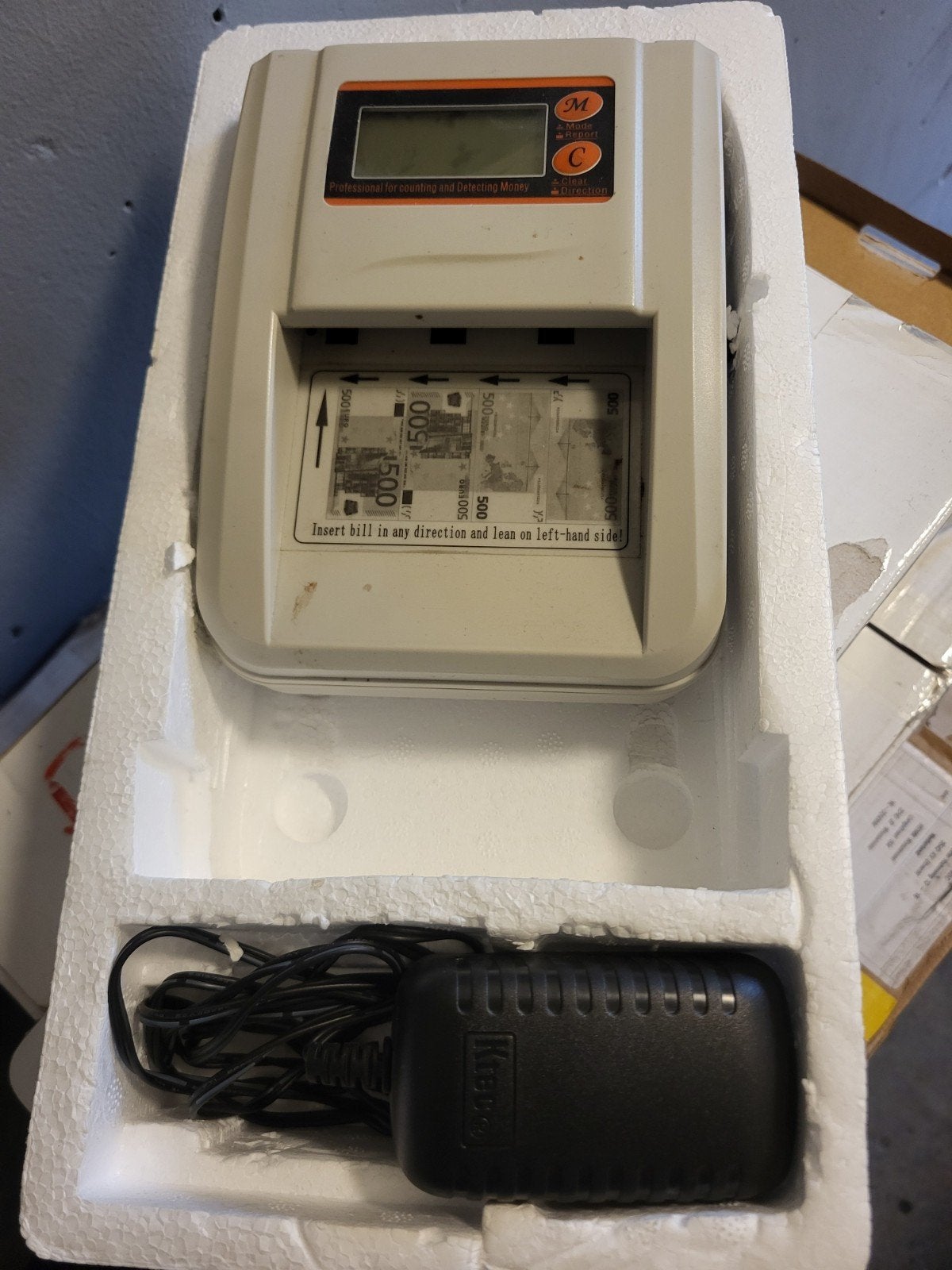 detector voor vals geld, Ophalen, Valsgelddetector