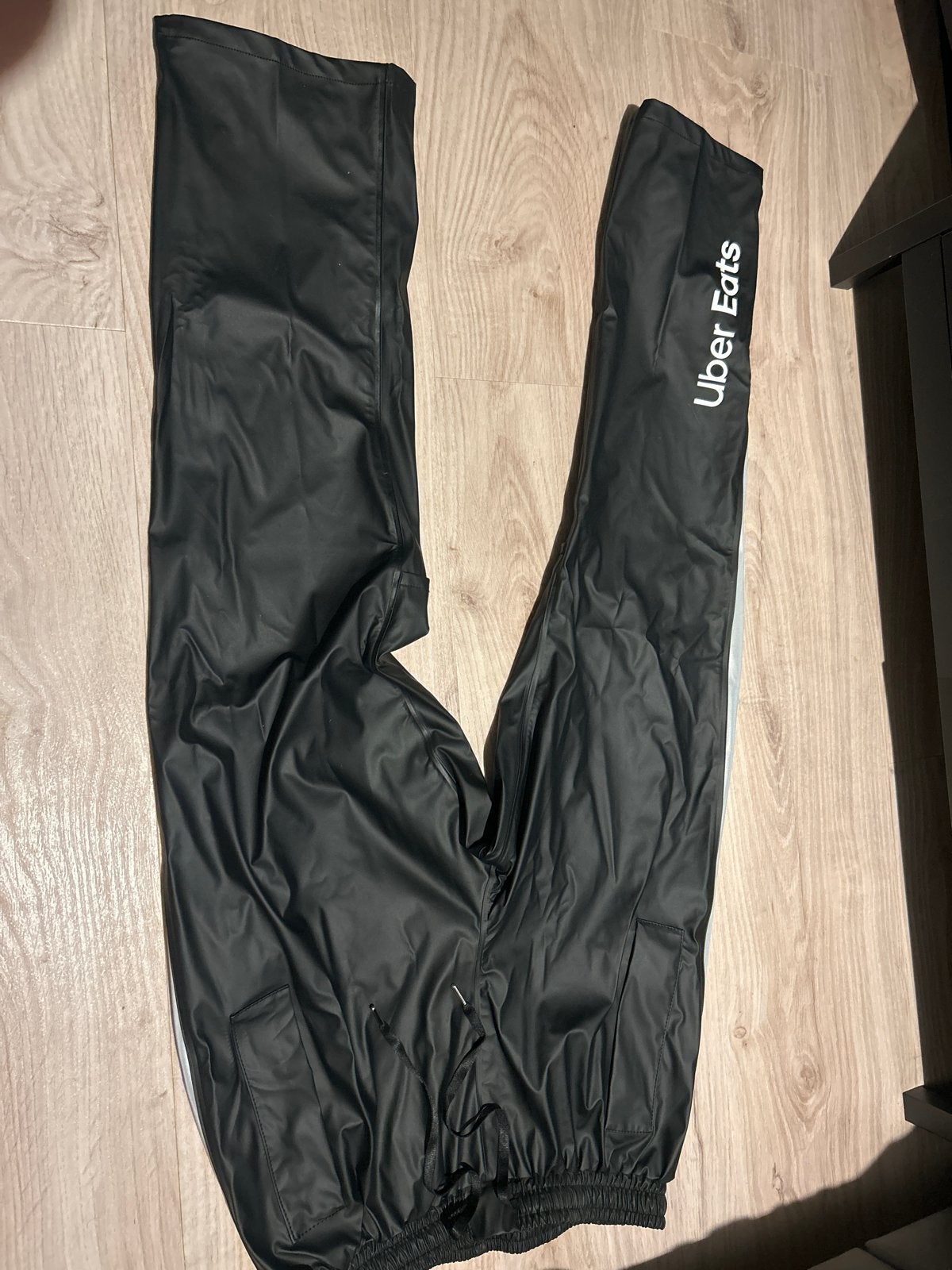 Uber Eats regenbroek - Zwart, maat L, Ophalen of Verzenden, Nieuw, Maat 52/54 (L), Zwart