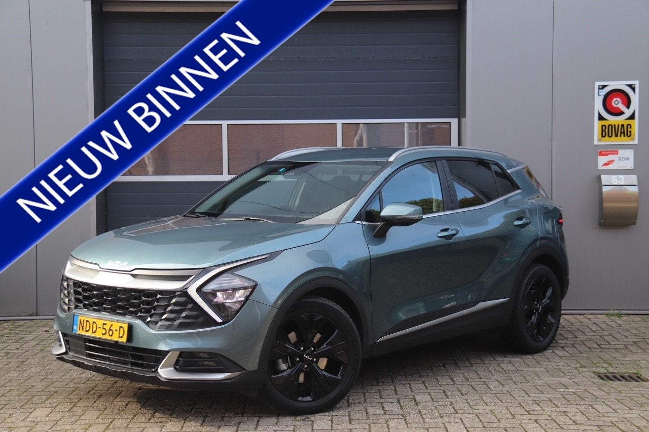 Kia Sportage 1.6 T-GDi Plug-in Hybrid AWD DynamicLine, Carpl, Auto's, Automaat, Stof, Gebruikt, 4 cilinders