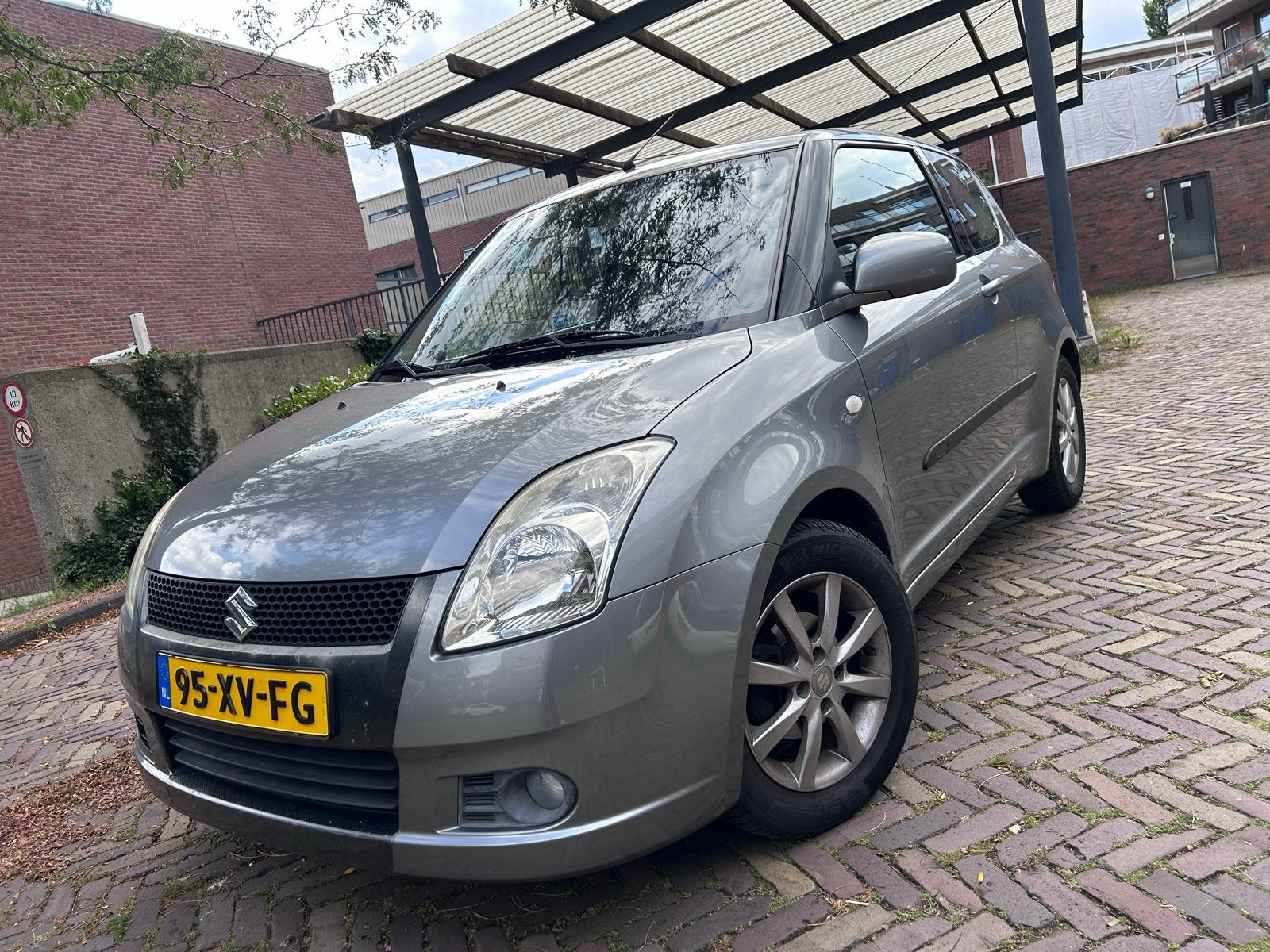 Suzuki Swift 1.3 3D 2007 Grijs, Auto's, 31 €/maand, Swift, Origineel Nederlands, Handgeschakeld