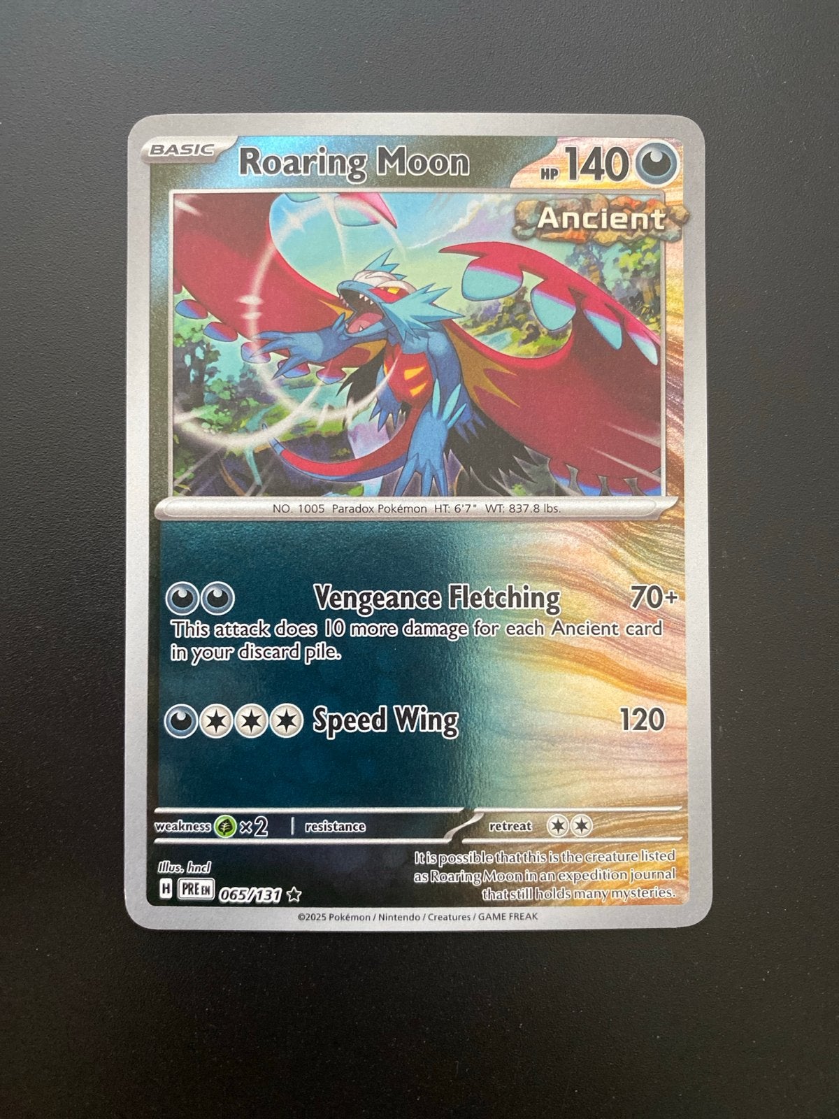Roaring Moon 065/131 Rare Reverse Holo Prismatic Evolutions, Ophalen of Verzenden, Zo goed als nieuw, Losse kaart, Foil