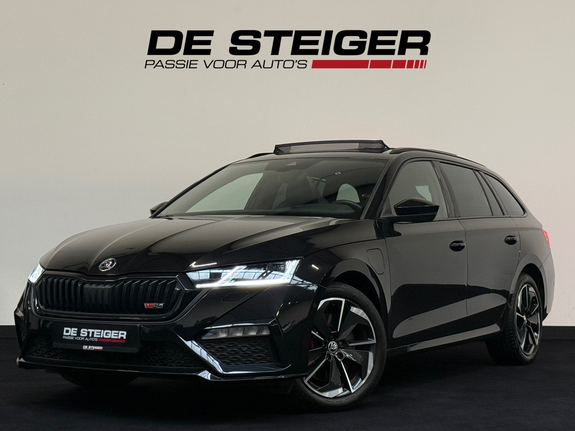 Skoda Octavia Combi 1.4 TSI RS iV PHEV Business Pano Headup, Auto's, Skoda, Gebruikt, Zwart, 4 cilinders, 150 pk