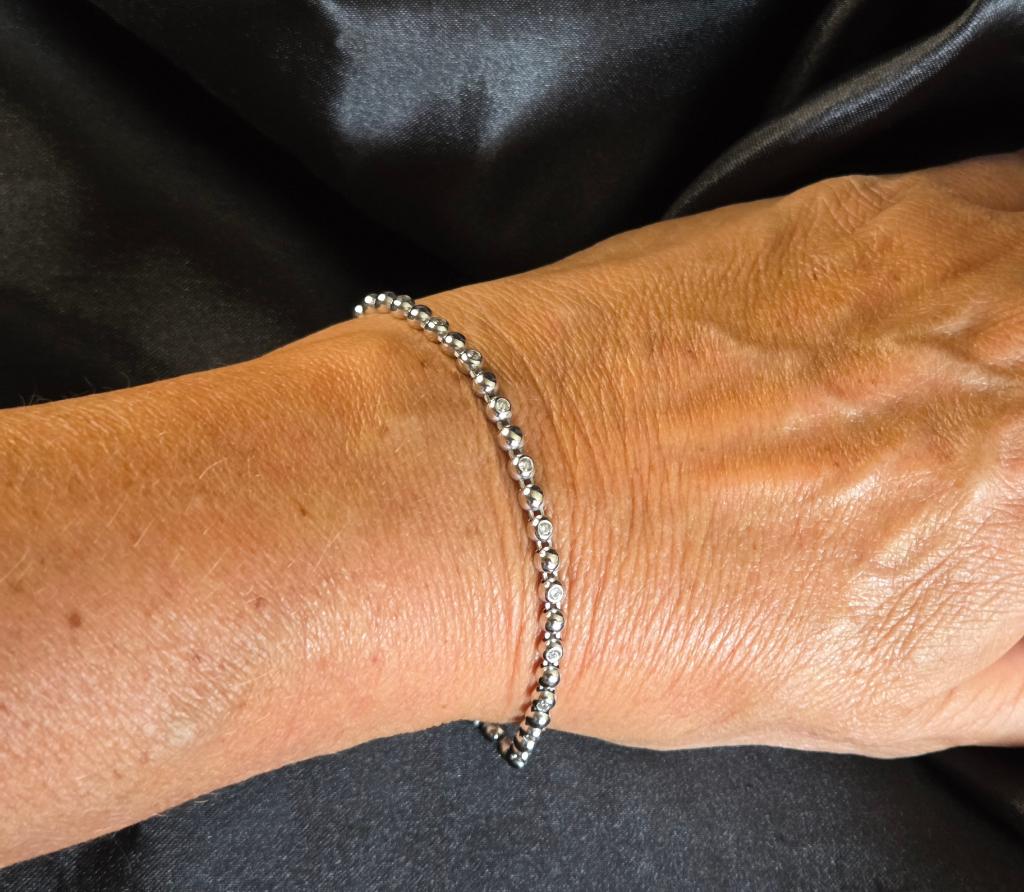 Zilver tennisarmband met zirkonia's. 2026/303.