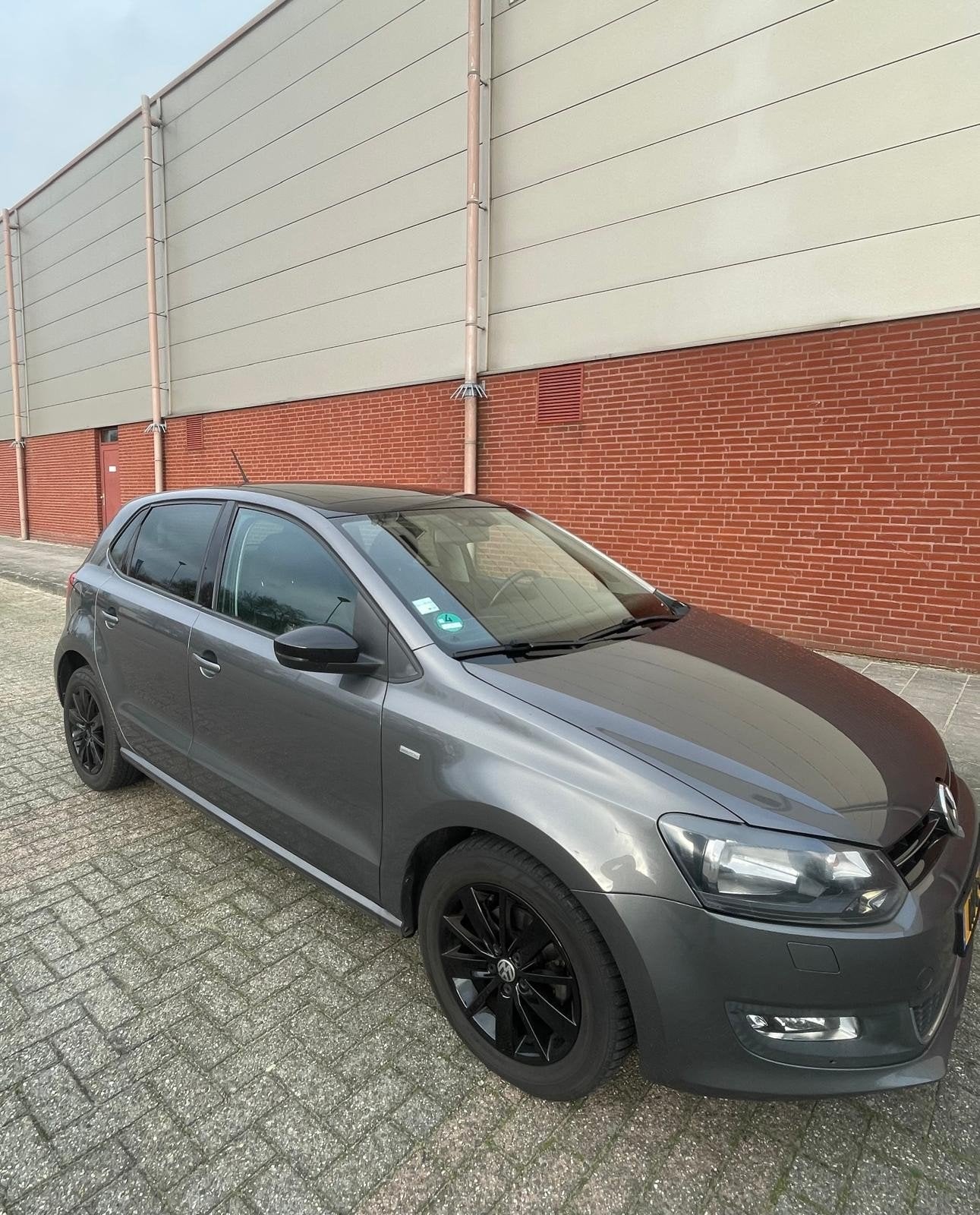 Volkswagen Polo 1.2 TSI Grijs metallic Apple carplay, Auto's, Voorwielaandrijving, Stof, Zwart, 4 cilinders