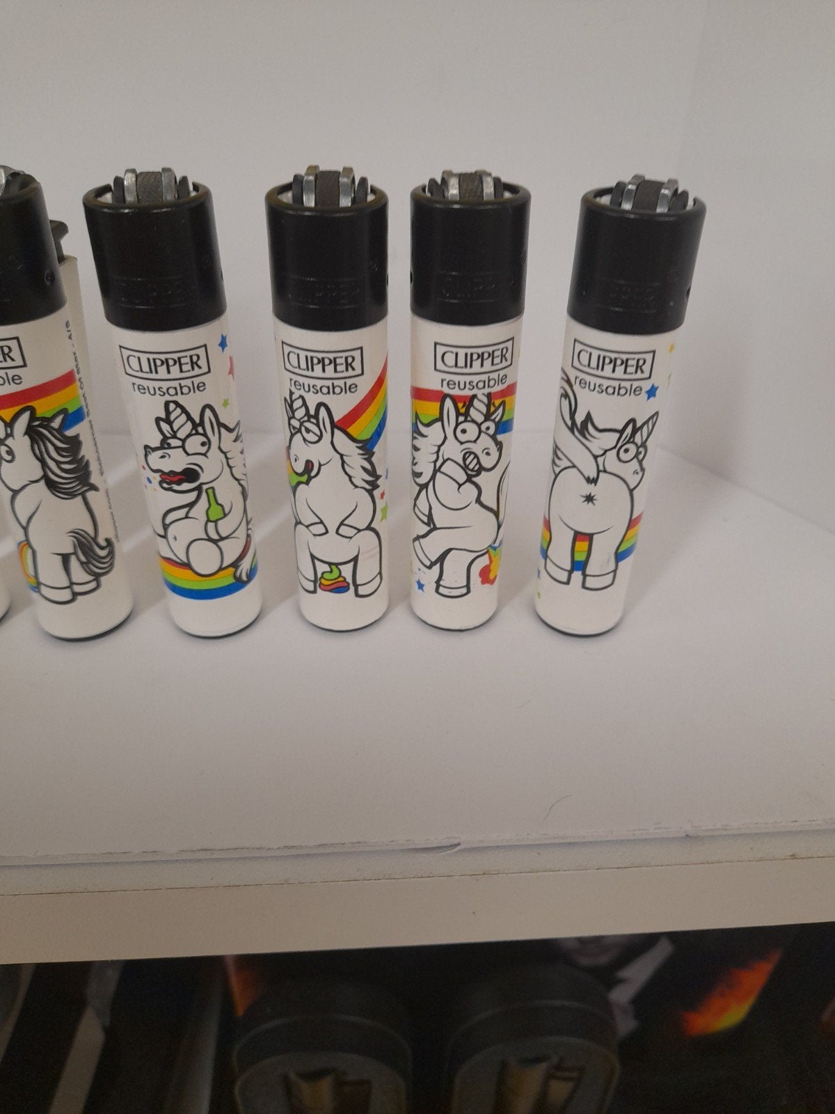 Clipper aansteker met eenhoorn opdruk., Verzamelen, Ophalen of Verzenden, Nieuw, Aansteker