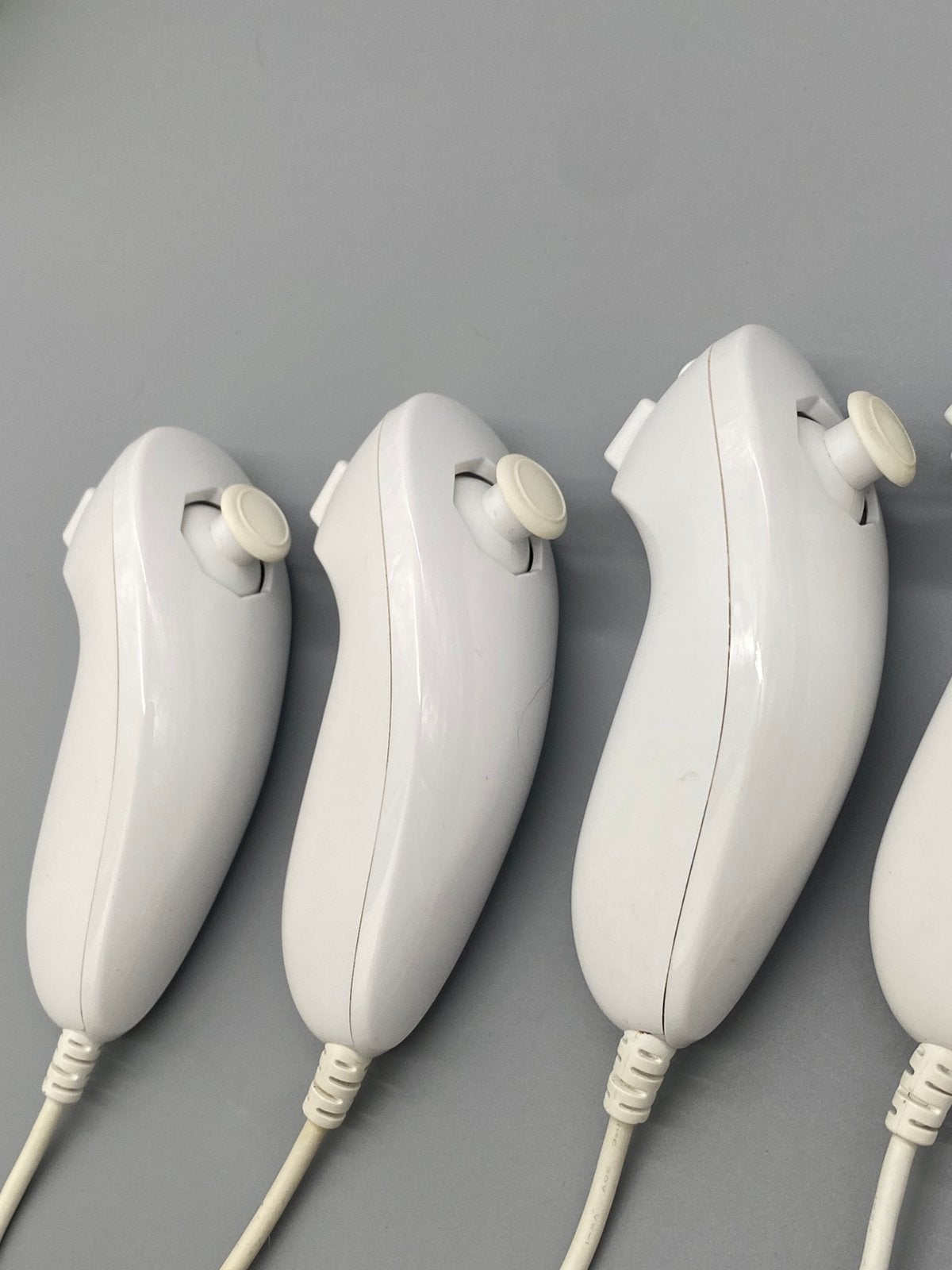 Originele Nintendo Wii Nunchuks Bundel (4x), Nintendo, Www.nintendo.com, Overige genres, Ophalen of Verzenden