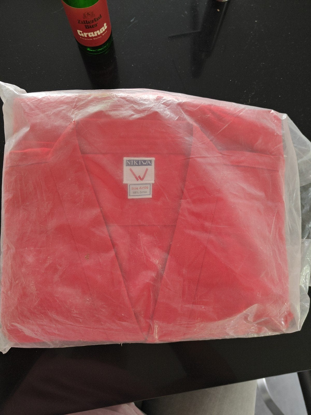 Nieuw rood NIKIWA karatepak - Maat 4/170, Ophalen of Verzenden, Nieuw, Overige