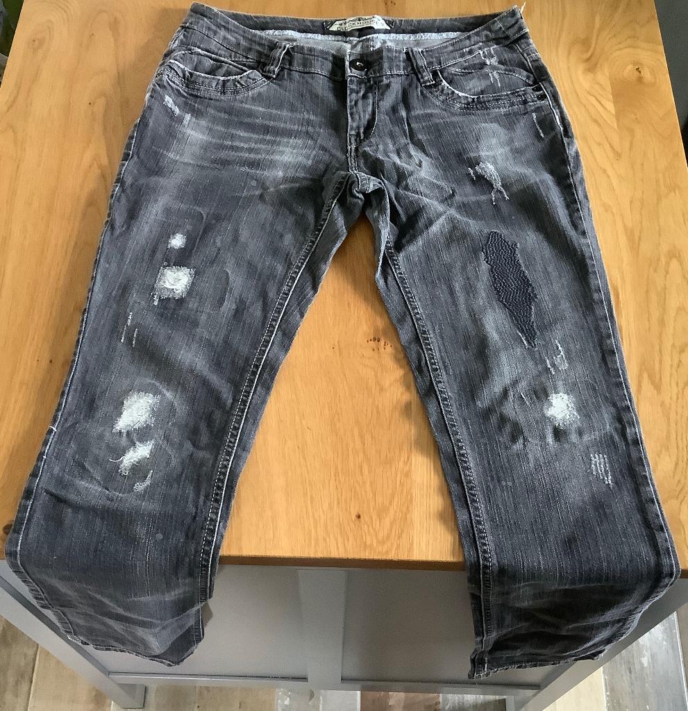 Clockhouse zwarte jeans maat 40 met scratch/damaged look, Zwart, Ophalen of Verzenden, Zo goed als nieuw, W30 - W32 (confectie 38/40)