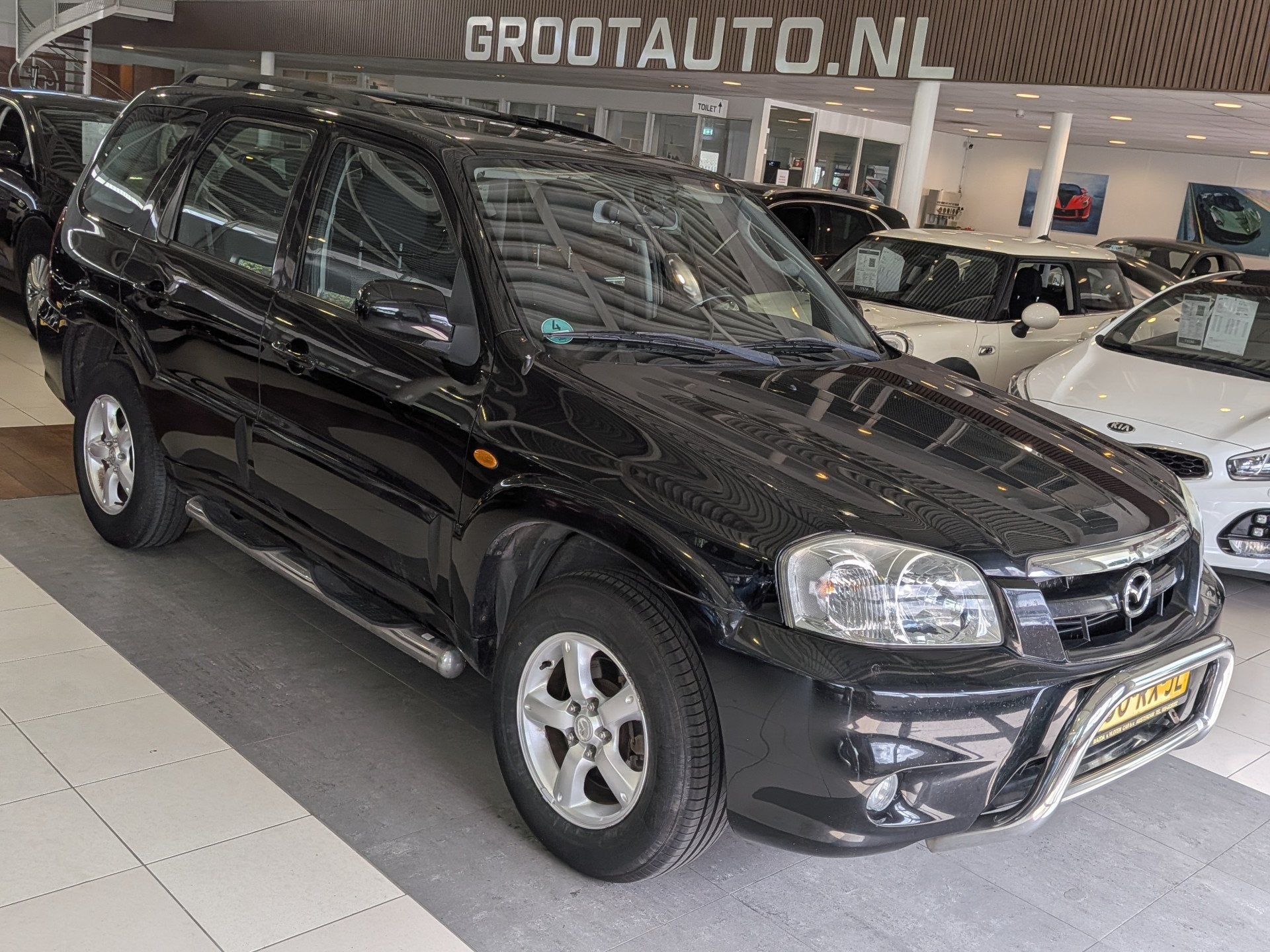 Mazda Tribute 2.3i Touring 4WD, Airco, Cruise Control, Stof, Gebruikt, 680 kg, 4 cilinders