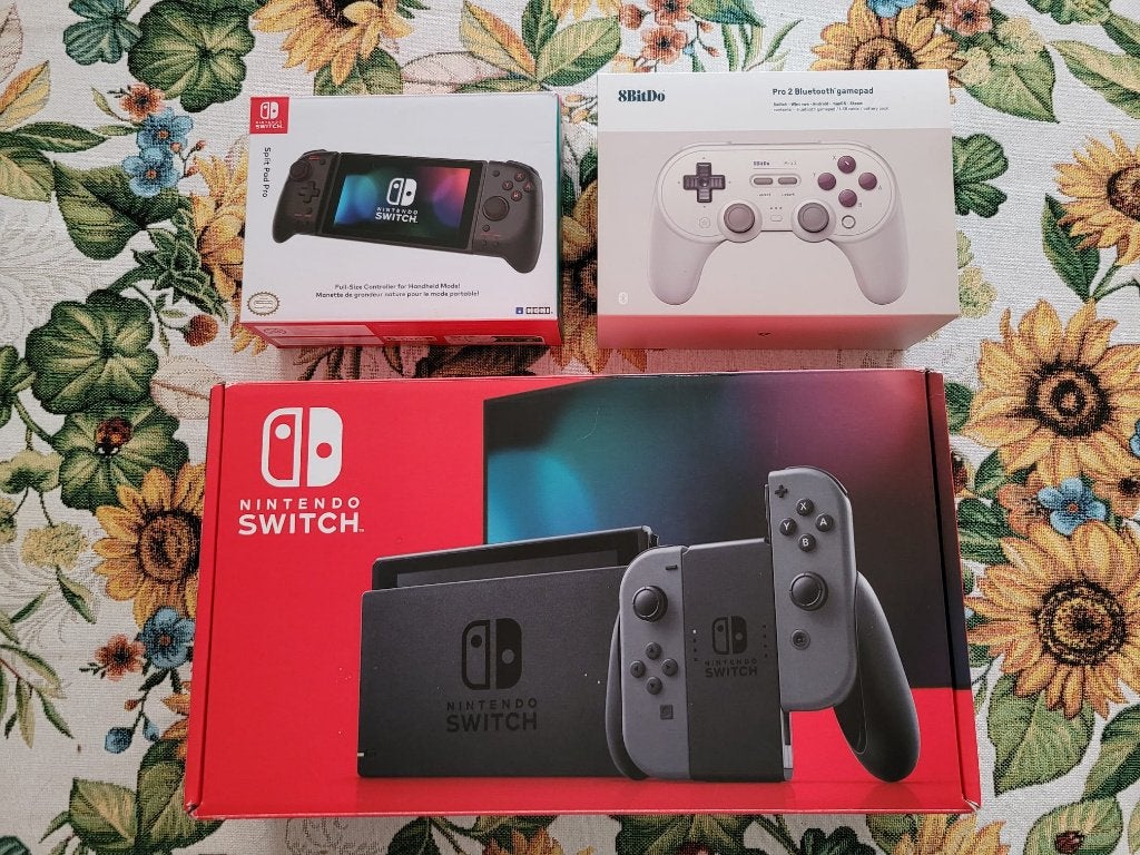 Nintendo Switch 1.5 + case + Split pad pro + 8BitDo Pro2, Ophalen of Verzenden, Zo goed als nieuw, Met 2 controllers, Switch 2019 Upgrade
