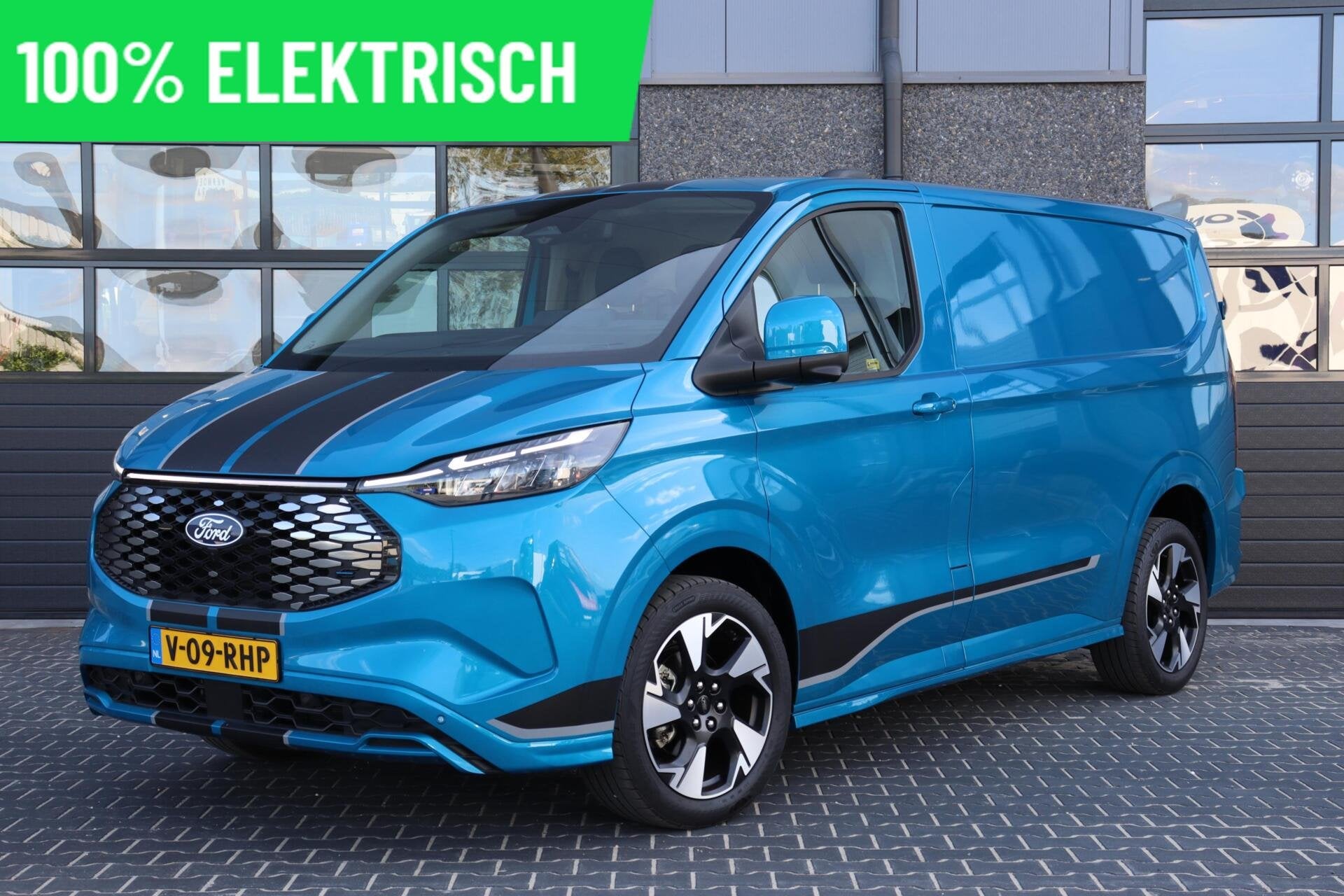 Ford E-Transit Custom L1H1 SPORT 65 kWh l ELEK. SCHUIFDEUR l, Auto's, Stof, Gebruikt, Zwart, Blauw