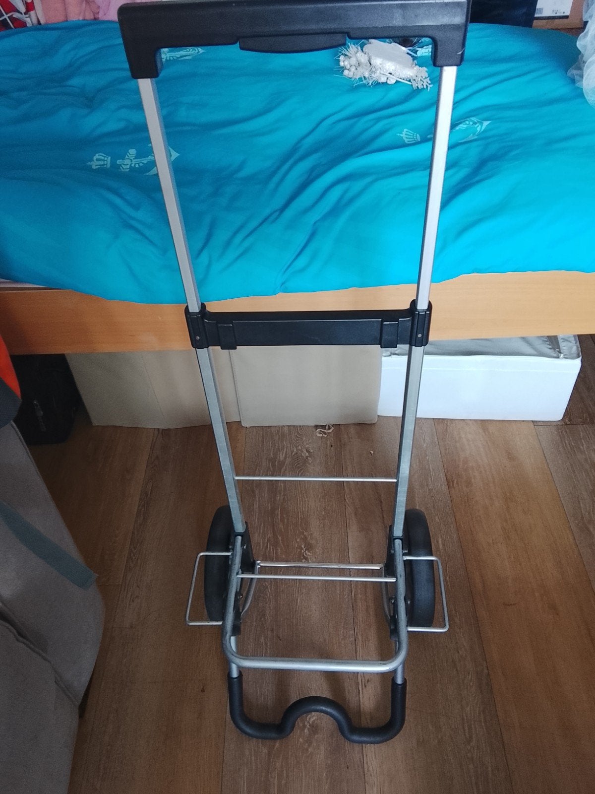 Opvouwbare boodschappenwagen / steekwagen, Ophalen