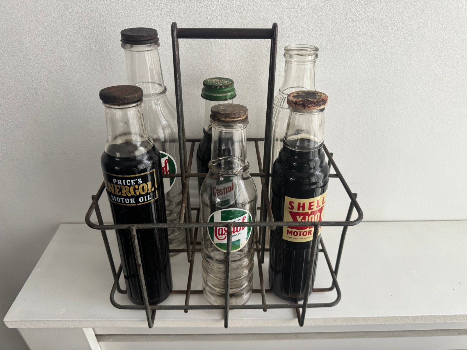 Oud Vintage Olie flessen rekjes Castrol Shell Esso Mobiloil, Ophalen of Verzenden, Gebruikt, Gebruiksvoorwerp