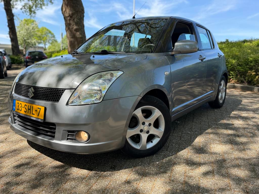 Suzuki Swift 1.3 GLS 5D KEYLESS AIRCO ELEKT/R  APK, Auto's, Suzuki, Voorwielaandrijving, Stof, 40 €/maand, Zwart