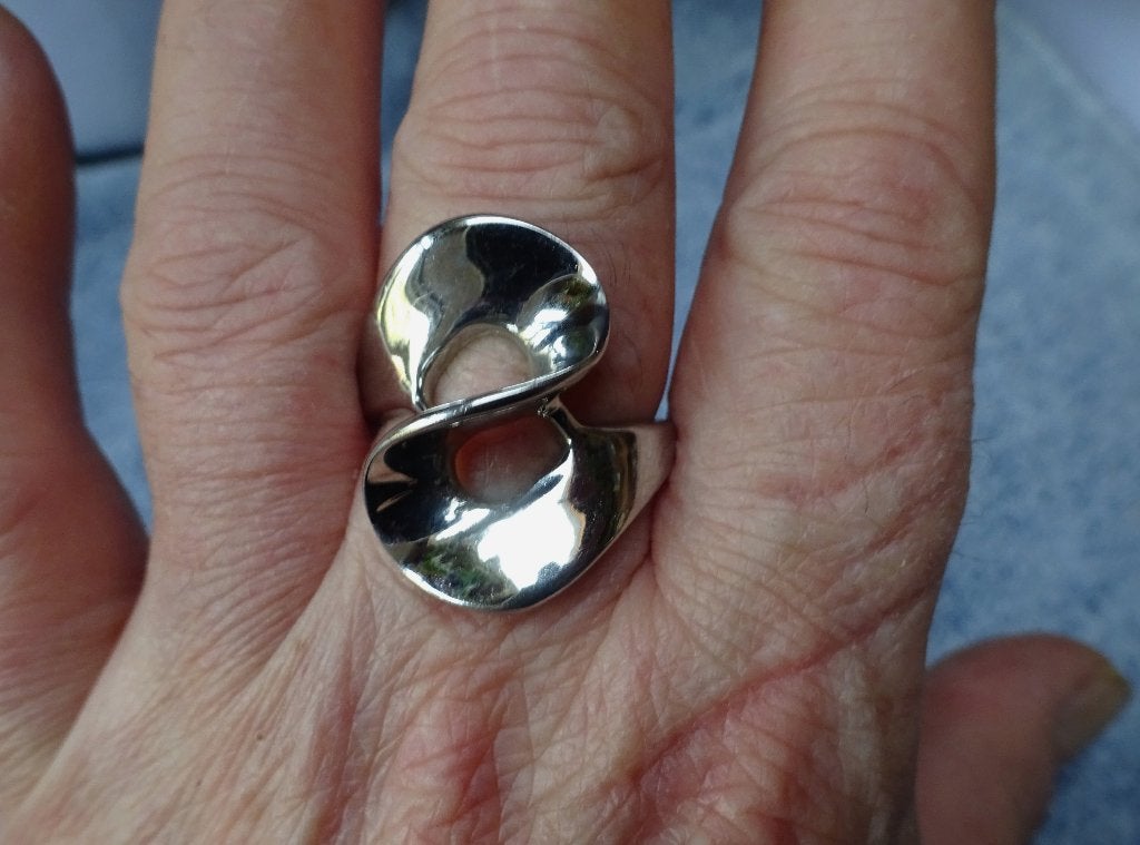 Zilverkleurige ixxxi#19 (RVS) ring golvende krul, Zo goed als nieuw, 17 tot 18, Dame, Zilver