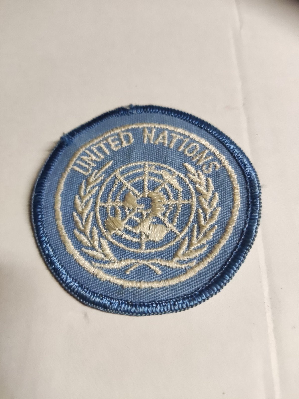 Mouwembleem United Nations UNTSO, Midden Oosten., Ophalen of Verzenden, Landmacht, Nederland