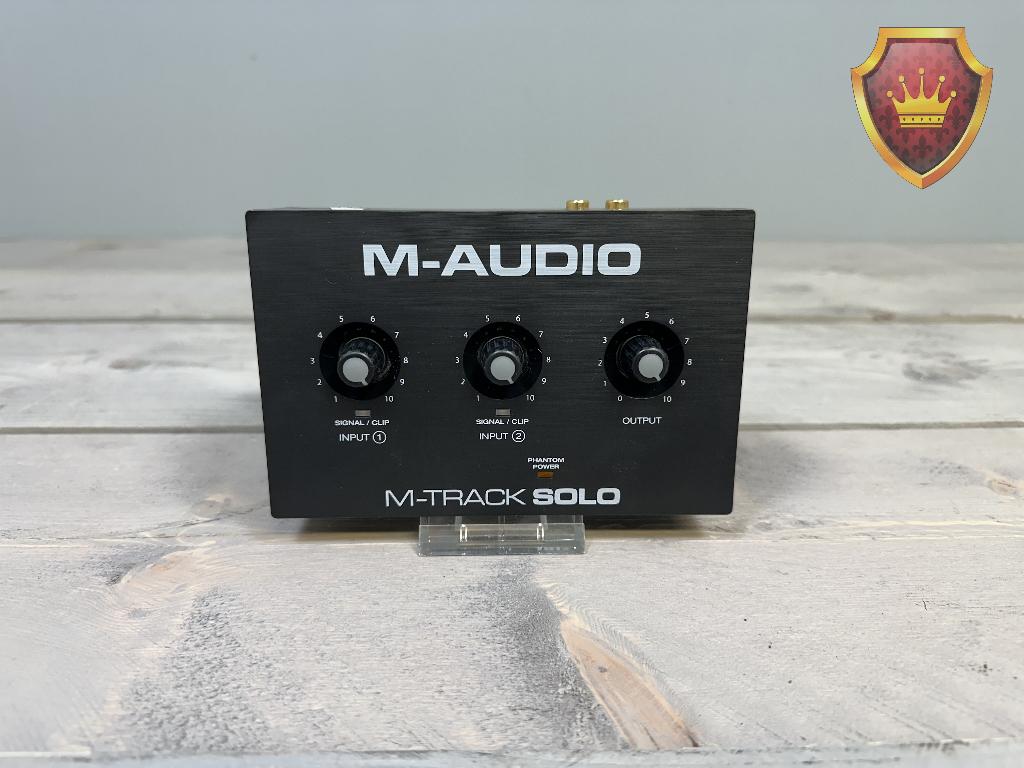 M-Audio M-Track Solo USB Audio Interface, Gebruikt, Thomann GmbH. Treppendorf Hans-Thomann-Straße 1. D-96138 Burgebrach, Germany.