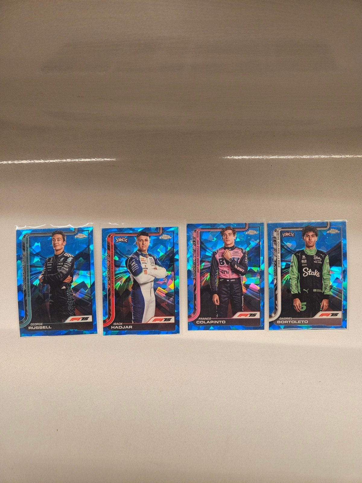 Russel hadjar colapinto bortoleto sapphire topps f1 2025, Ophalen of Verzenden, Nieuw, Plaatje
