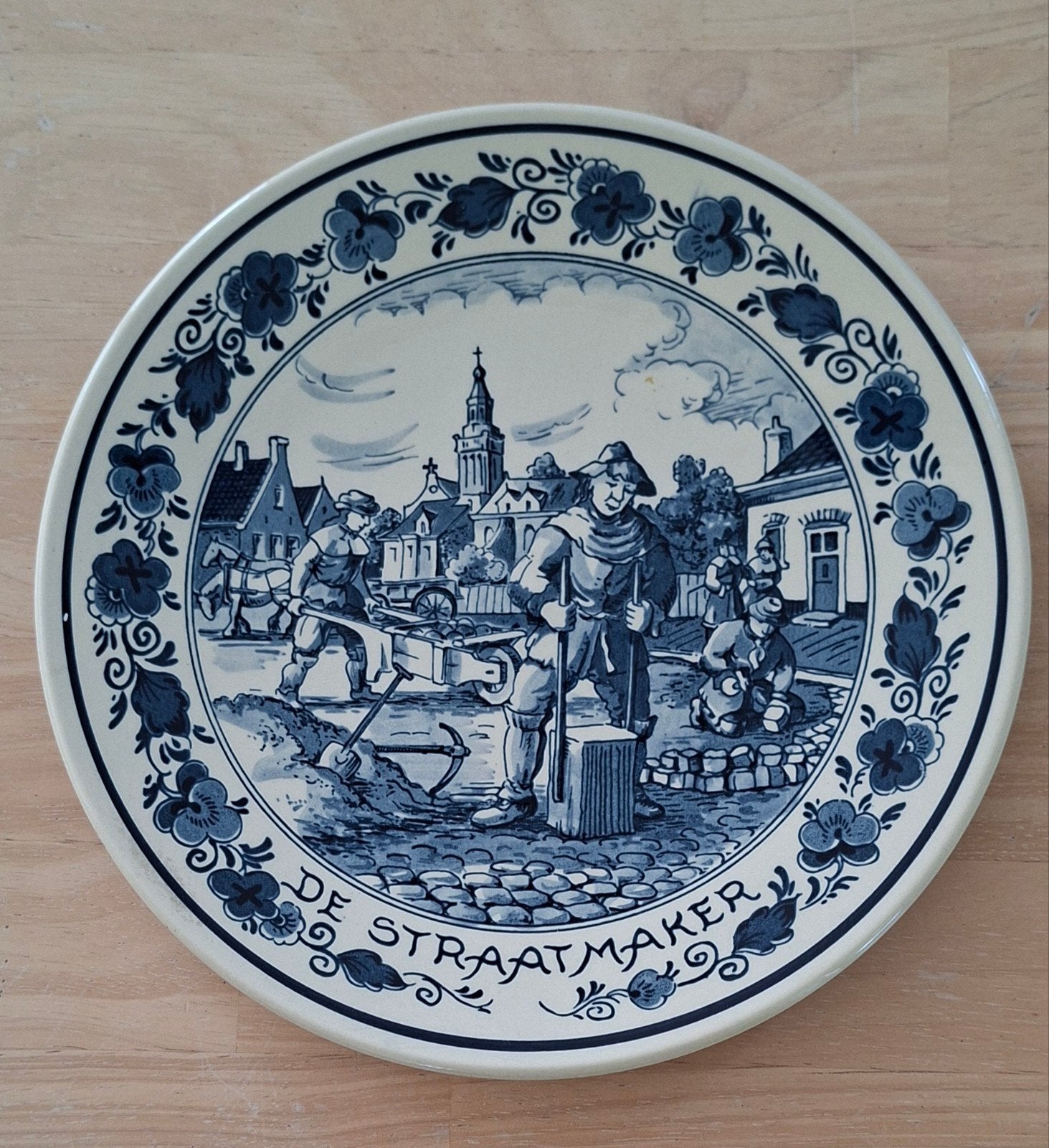 Wandbord : de straatmaker, Antiek en Kunst, Ophalen of Verzenden