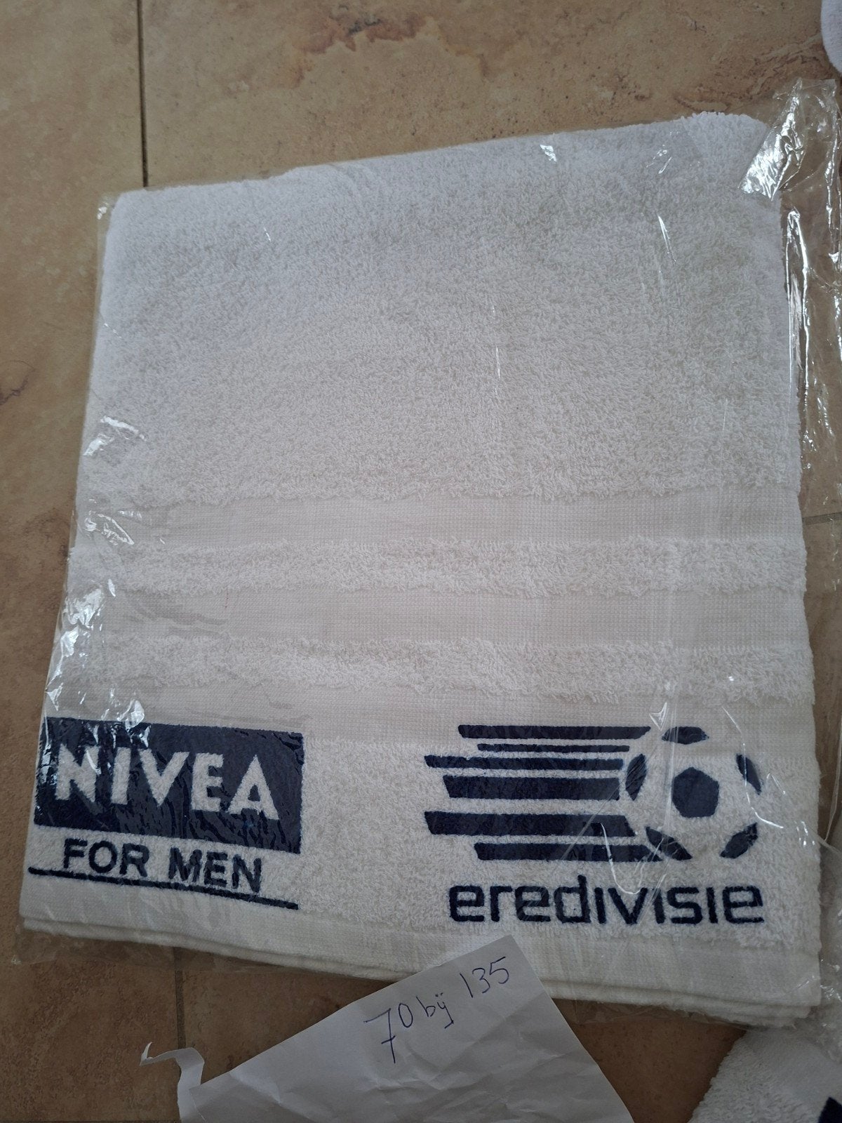 Sauna Vaderdag omslagbaddoek Nivea in folie., Ophalen of Verzenden, Nieuw, Wit, Overige typen