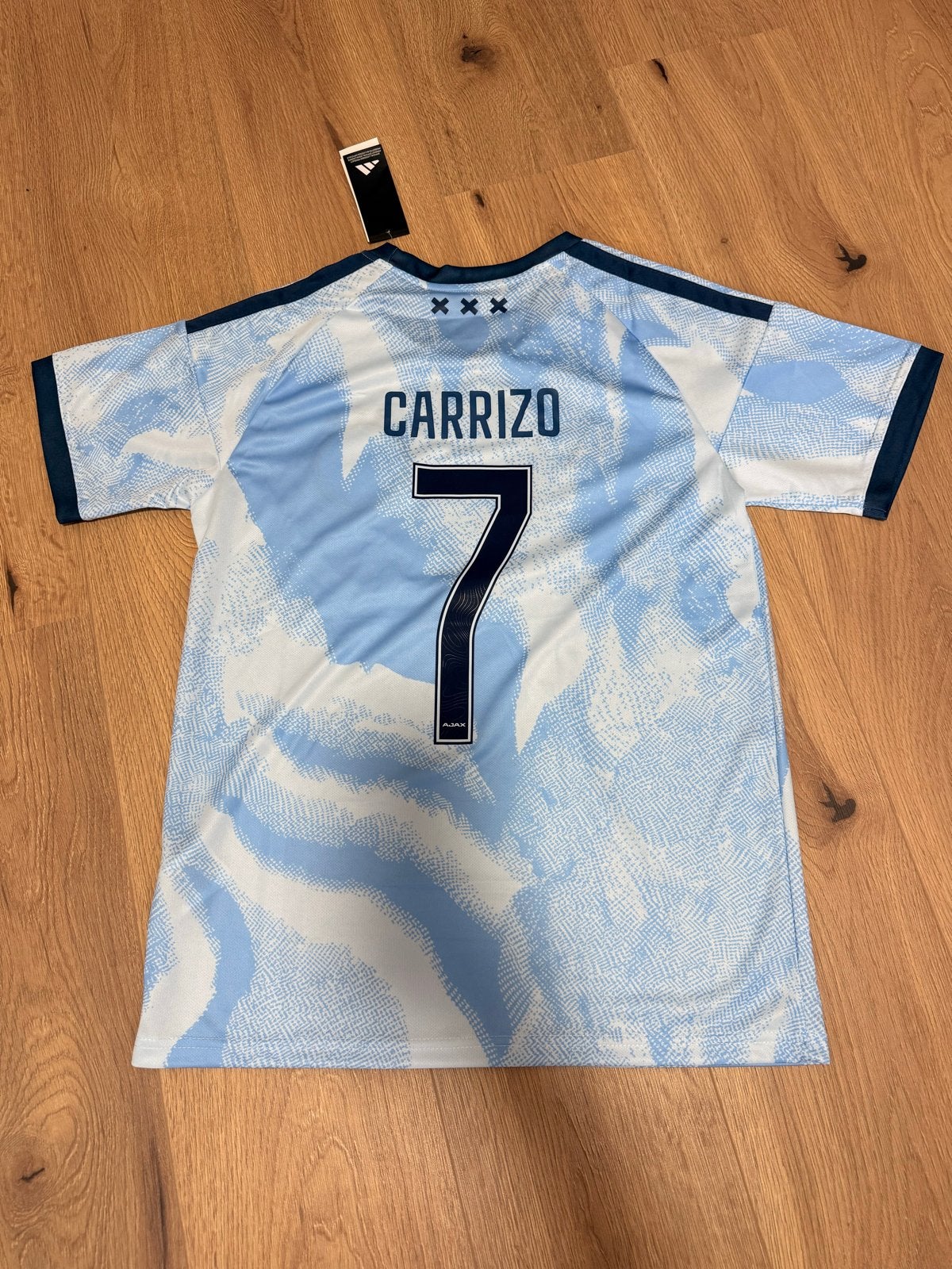Ajax uitshirt 2026/2027 Carrizo #7 - Maat S, Maat S, Ophalen of Verzenden, Nieuw, Shirt
