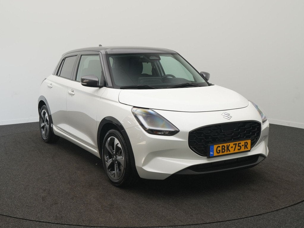 Suzuki Swift 1.2 Style Smart Hybrid - RIJKLAARPRIJS - 1e Eig, Stof, Gebruikt, 400 kg, Overige brandstoffen