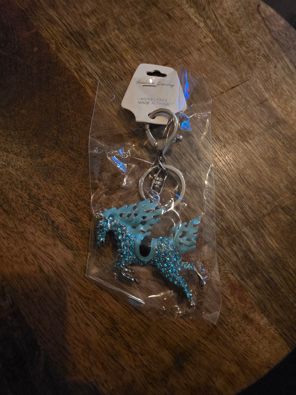 Sleutelhanger met blauwe Pegasus - Nieuw, Ophalen of Verzenden, Nieuw