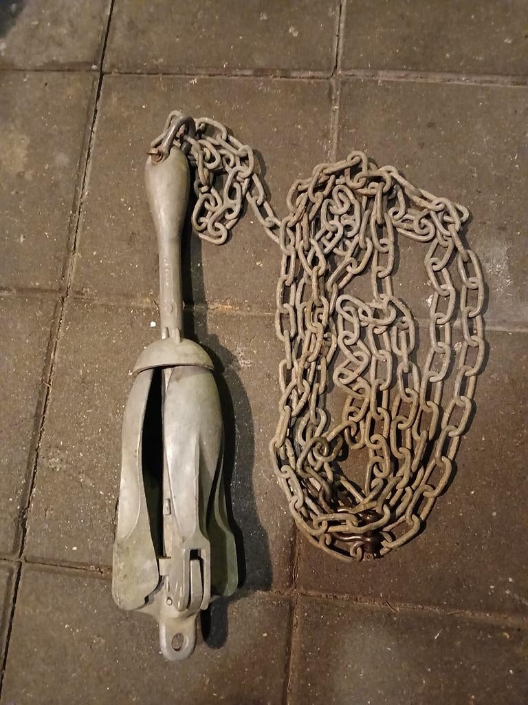 Paraplu anker met ketting, Ophalen