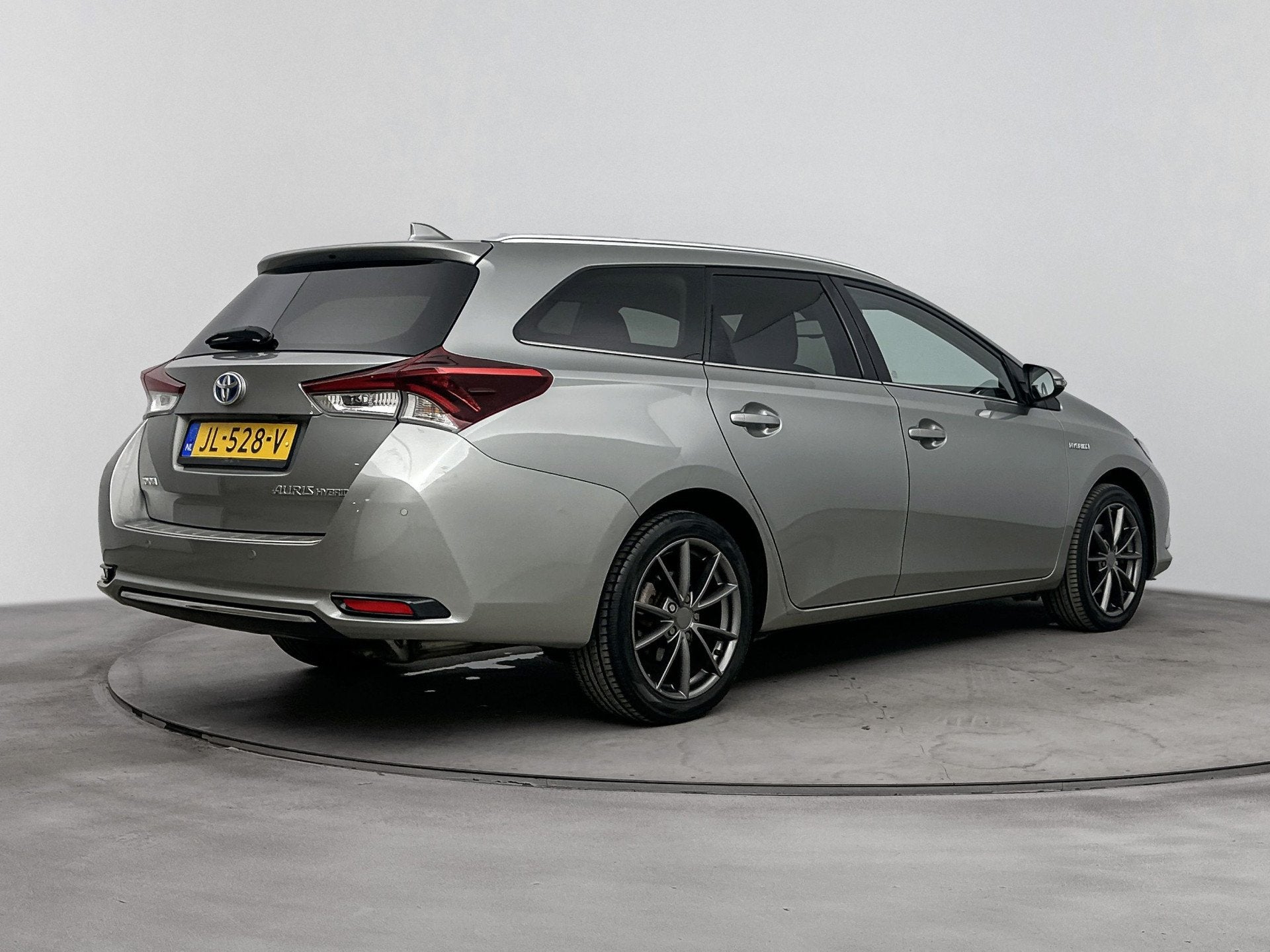 Toyota Auris Touring Sports 1.8 Hybrid Executive | Dealer On, Auto's, Gebruikt, Leder en Stof, Origineel Nederlands, Hybride Elektrisch/Benzine