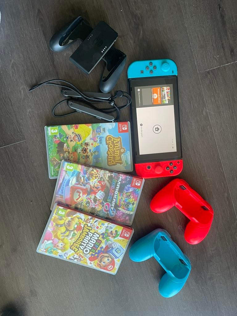 Nintendo Switch + 3 games + accessoires (zo goed als nieuw), Spelcomputers en Games, Spelcomputers | Nintendo Switch, Ophalen of Verzenden