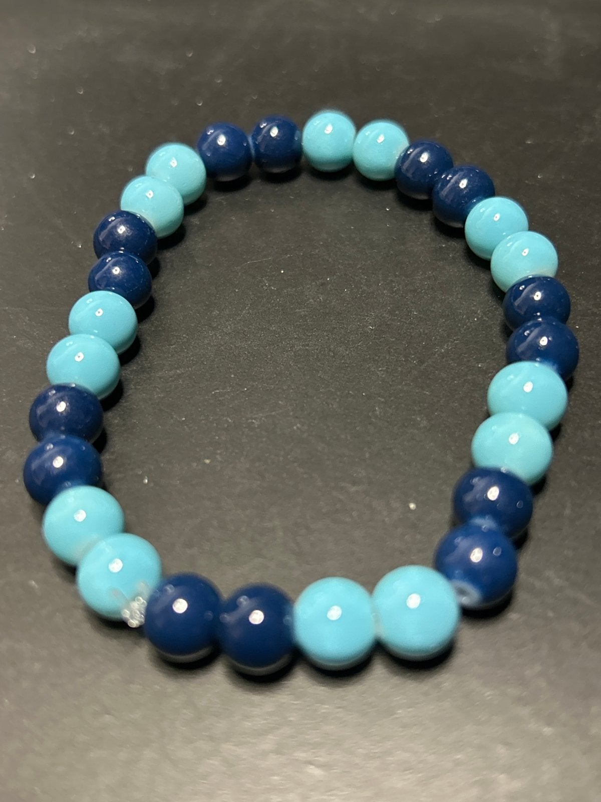 Kralenarmband in blauw en turquoise, Overige materialen, Nieuw, Met bedels of kralen, Verzenden