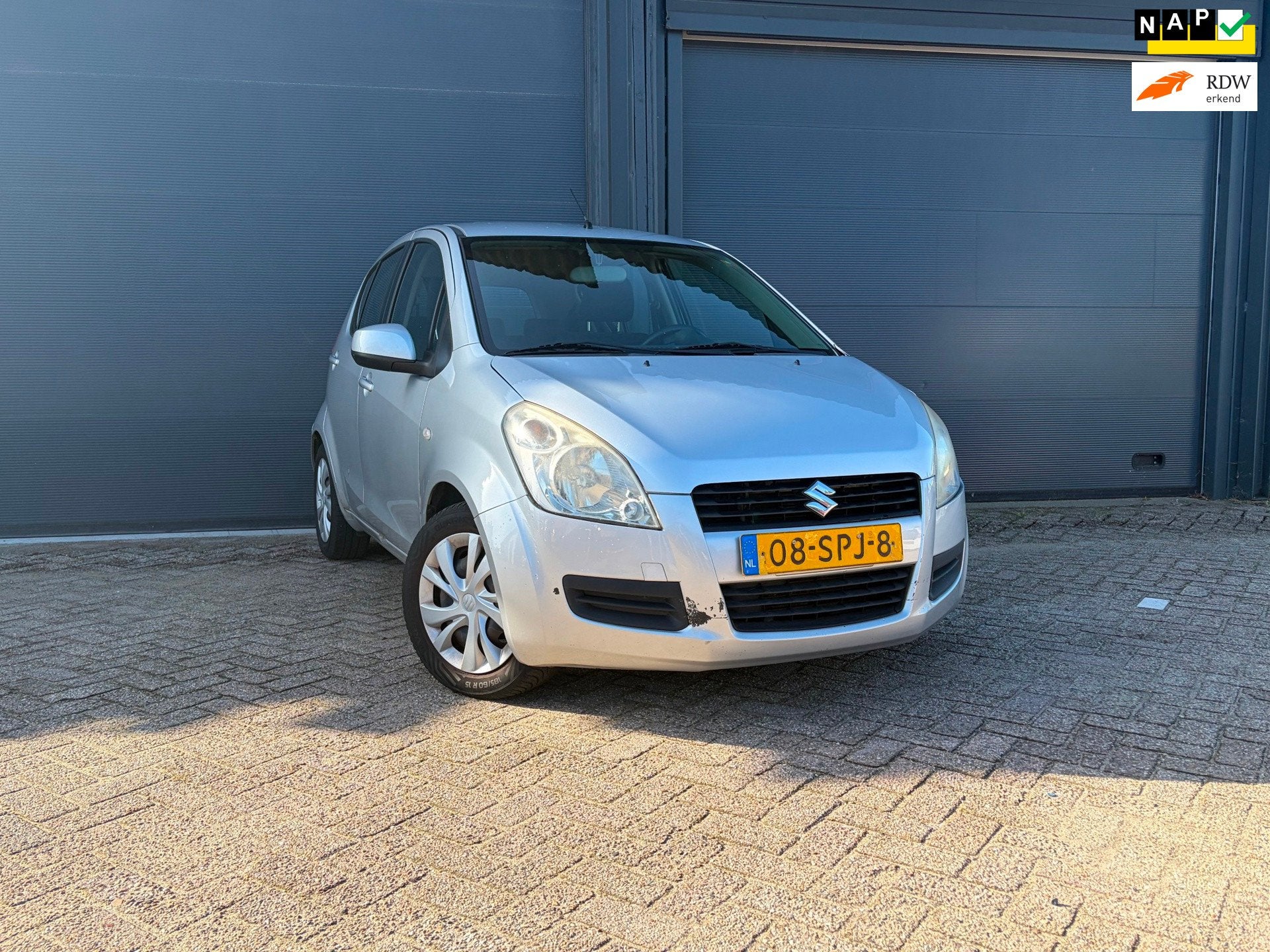 Suzuki Splash 1.0 | 5 Deurs | Airco | Trekhaak | NAP |, Euro 5, Gebruikt, 31 €/maand, Verwarmde buitenspiegels