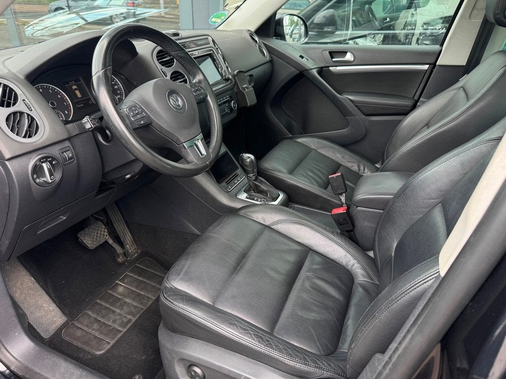 Volkswagen Tiguan 2.0 TSI Sport&Style 4Motion CarPlay, Automaat, Gebruikt, Zwart, 4 cilinders