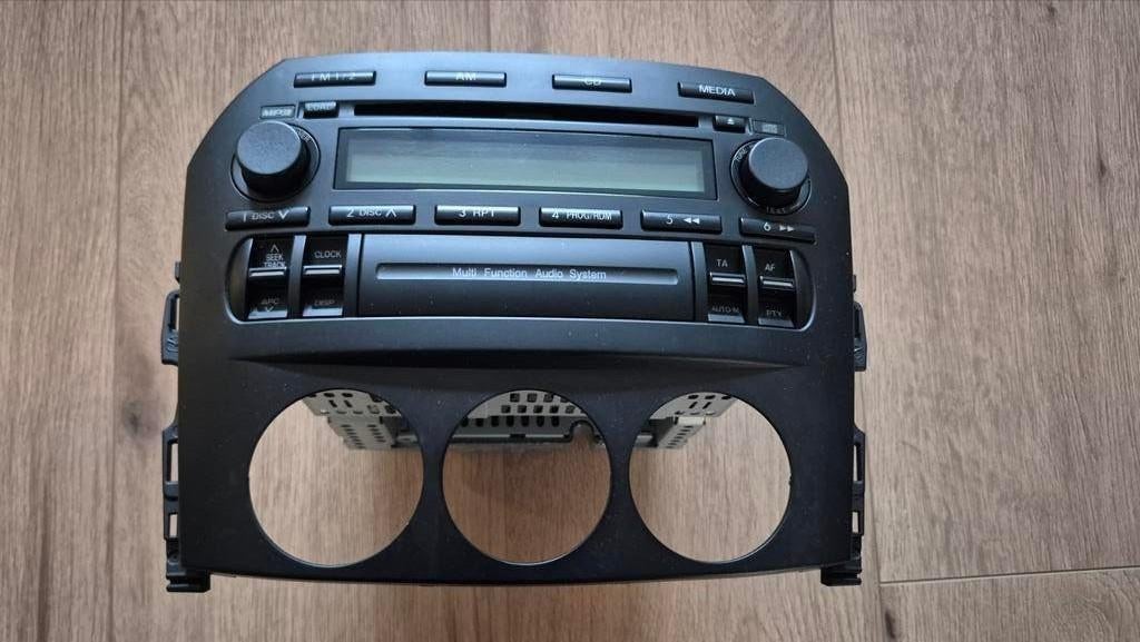 Originele Autoradio/  cd en mp3 speler Mazda MX5 NC, Ophalen