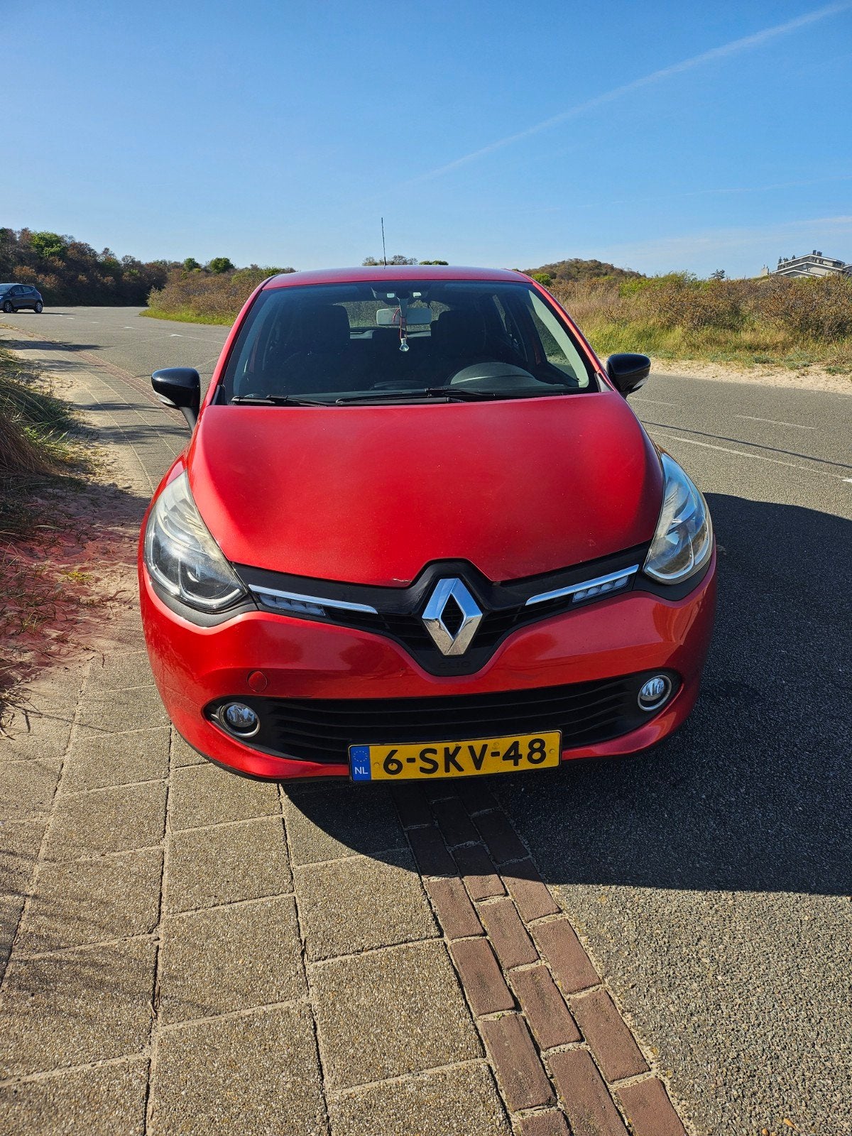 Renault Clio 0.9 TCE 66KW 5-DRS 2013 Rood, Auto's, Renault, Voorwielaandrijving, 898 cc, 40 €/maand, 540 kg