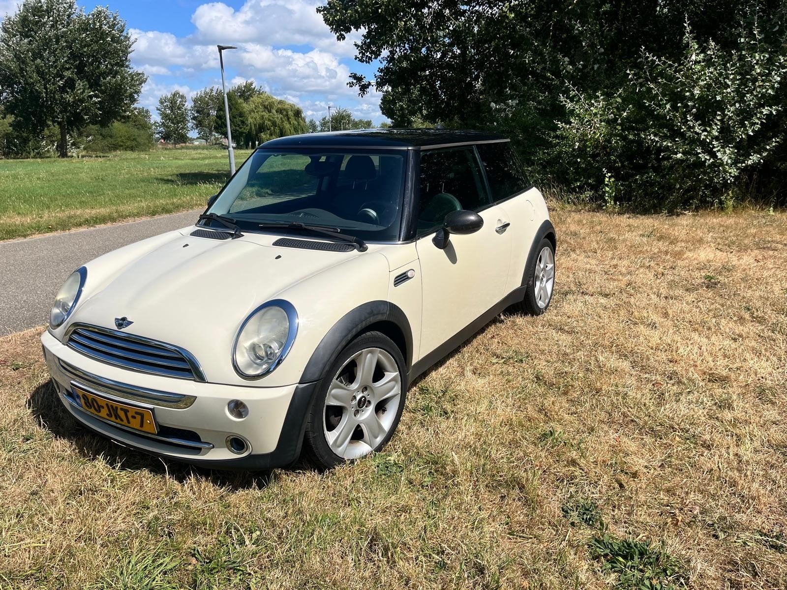 Mini 1.6 16V Cooper 2006 Wit, Auto's, Zwart, 4 cilinders, 4 stoelen, Leder en Stof