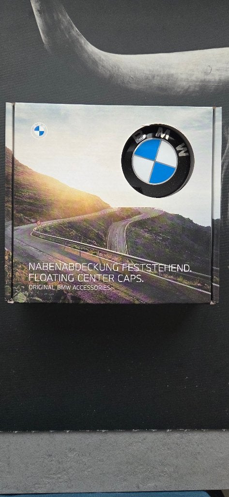 Originele set BMW meedraaiende naafdoppen, Auto diversen, Ophalen of Verzenden, Nieuw