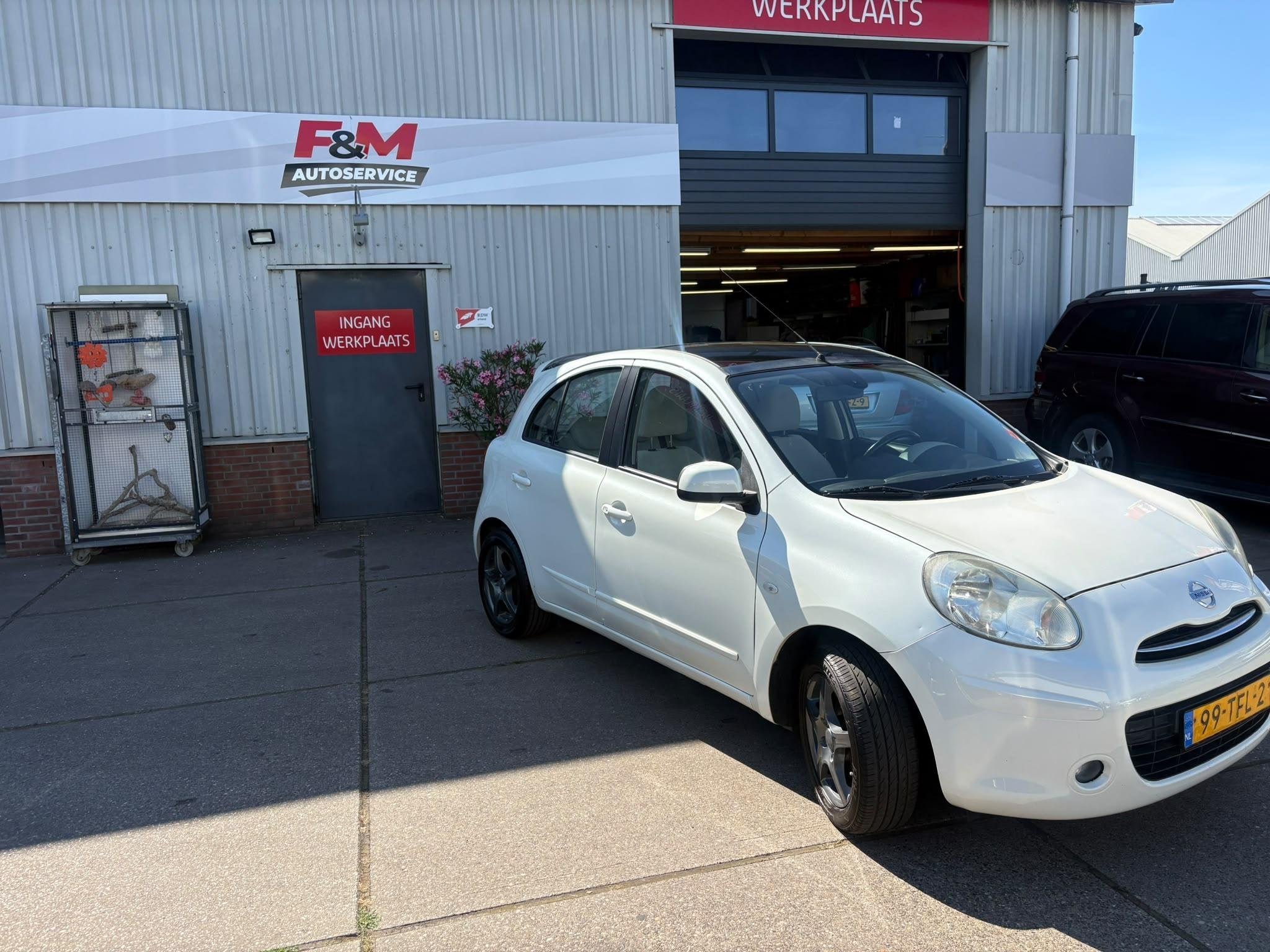Nissan Micra 1.2 DIG-S Tekna airco, cruise, pano, pdc achter, Voorwielaandrijving, Euro 5, Stof, Parkeersensor