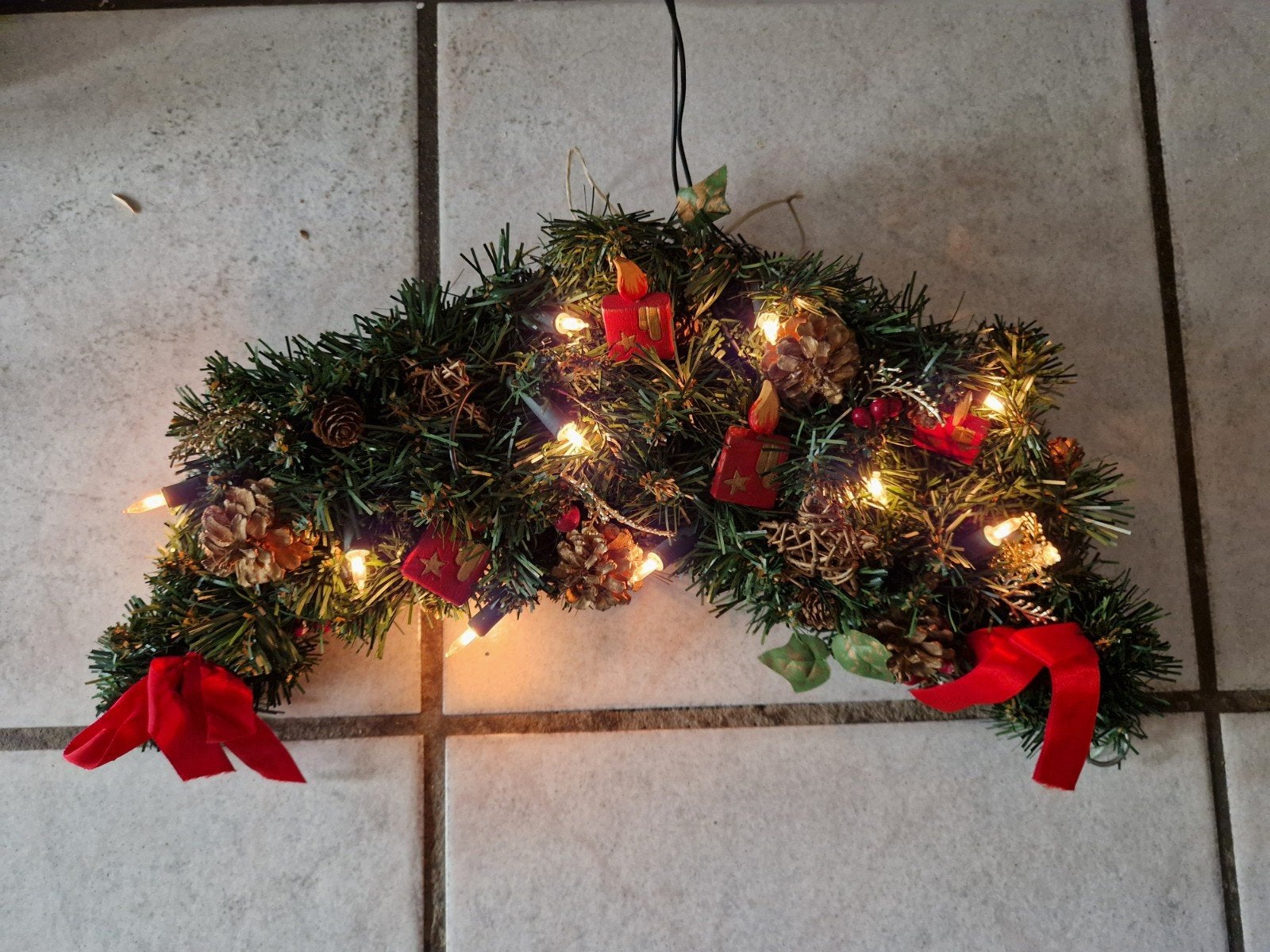 Kerstboog met verlichting, Ophalen
