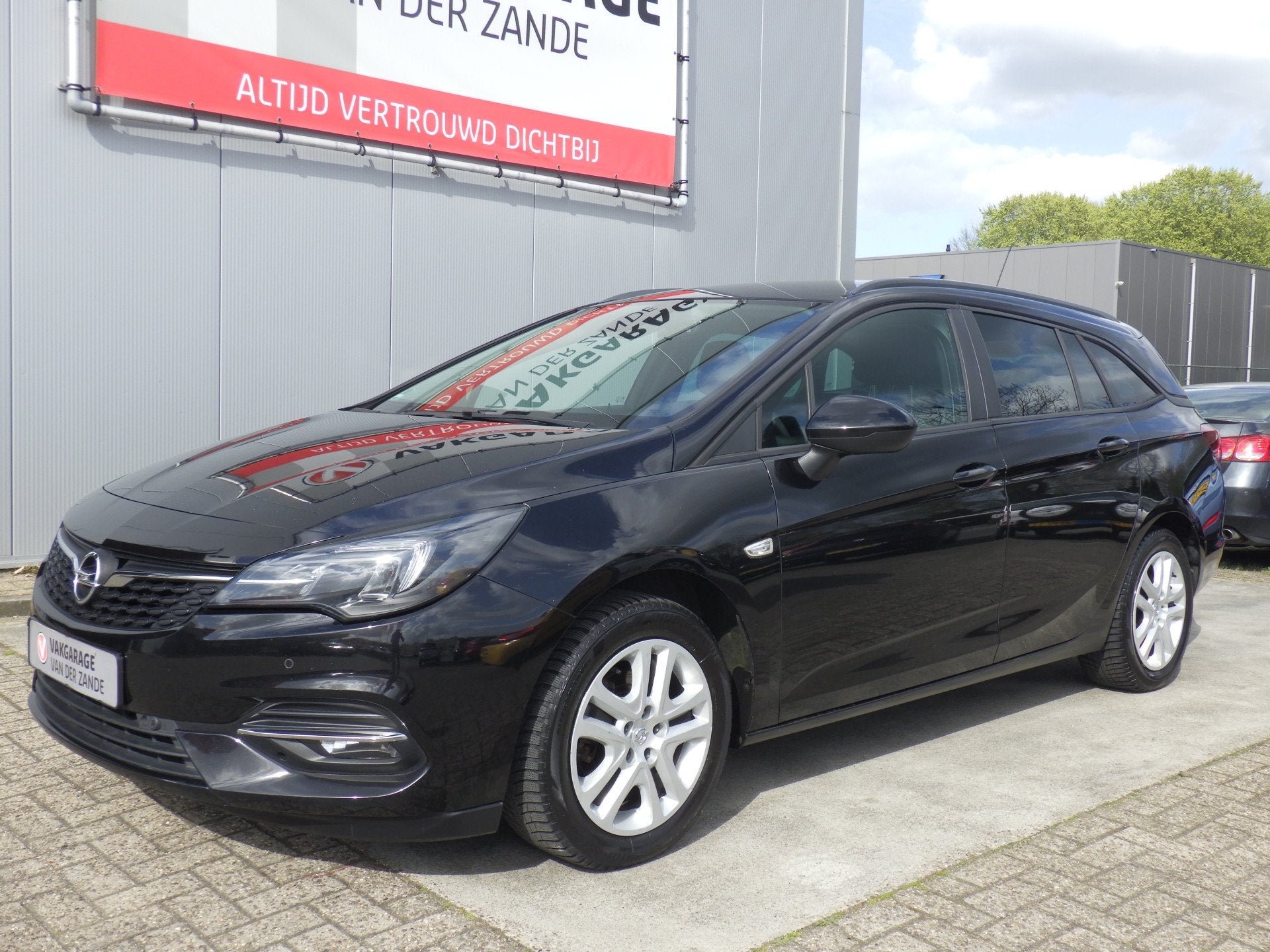 Opel Astra Sports Tourer 1.2 Edition, Trekhaak, Camera, Carp, Auto's, Stof, Gebruikt, Zwart, 1199 cc