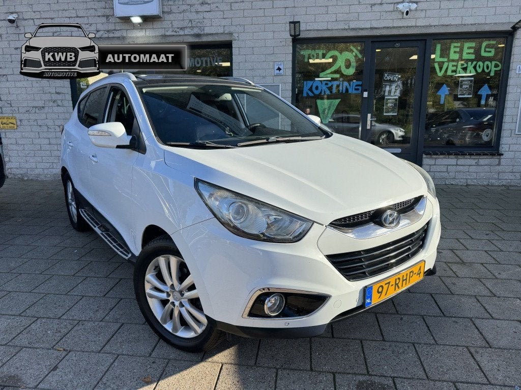 Hyundai ix35 2.0i Panoramadak Leer Automaat Camera, Auto's, Verwarmde buitenspiegels, Gebruikt, 4 cilinders, 1600 kg
