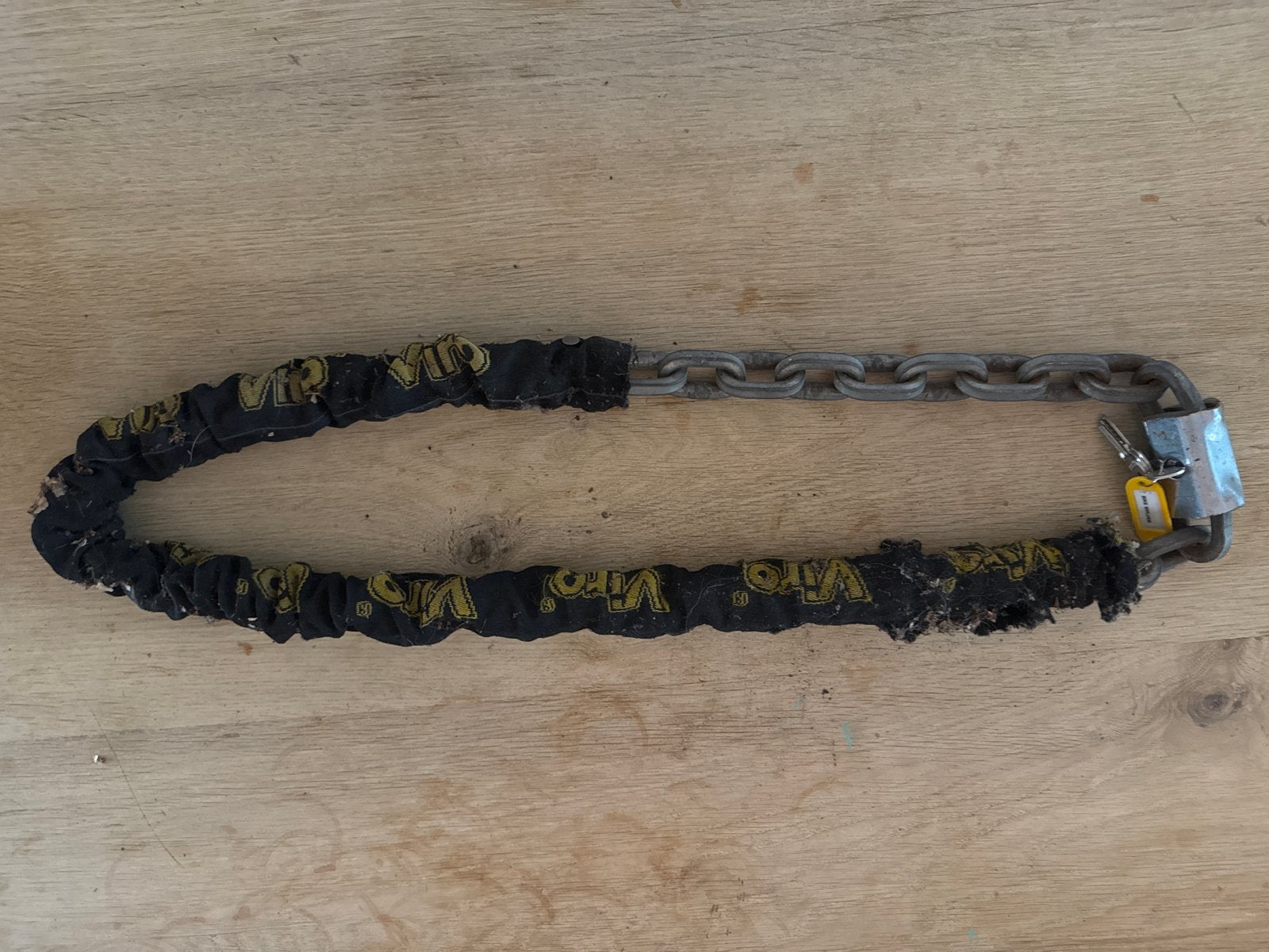 Viro kettingslot met hangslot, Ophalen, Gebruikt