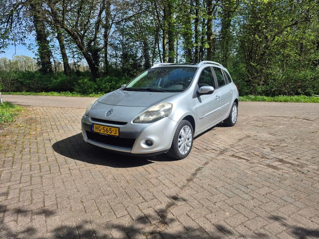 Renault Clio 1.2 16V 55KW Estate 2011 Grijs airco pano dak, Auto's, Voorwielaandrijving, 74 pk, Zwart, 4 cilinders