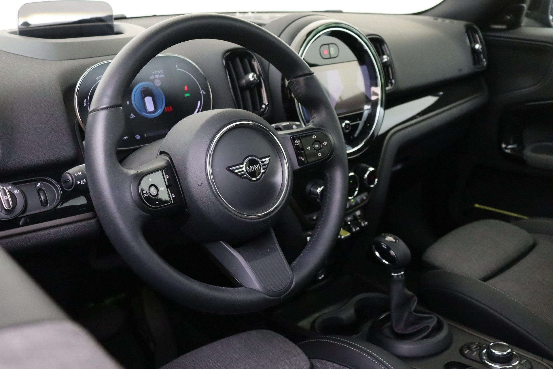 MINI Countryman Cooper S E ALL4 Automaat / Panoramadak / Com, Auto's, Automaat, Dealer onderhouden, Gebruikt, Zwart