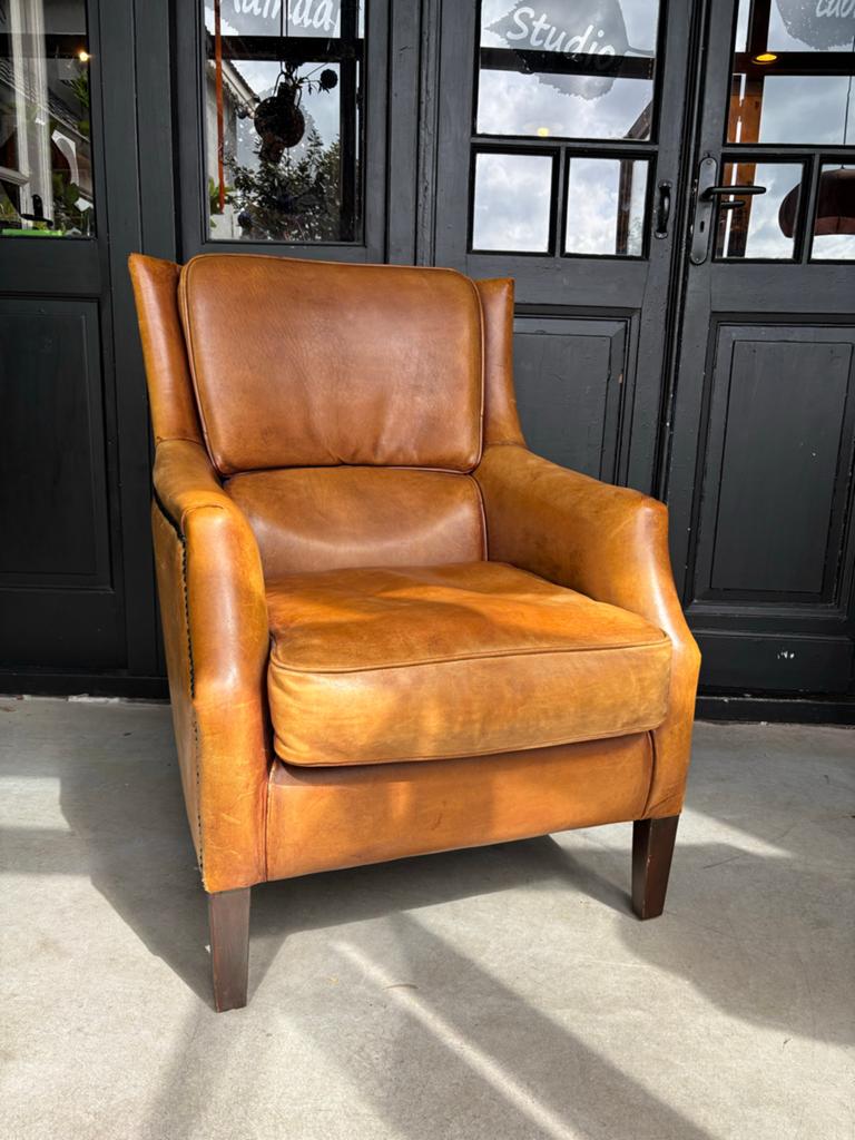 Schapenleren fauteuil model Tessa, Huis en Inrichting, Gebruikt, Vintage, 75 tot 100 cm, Leer