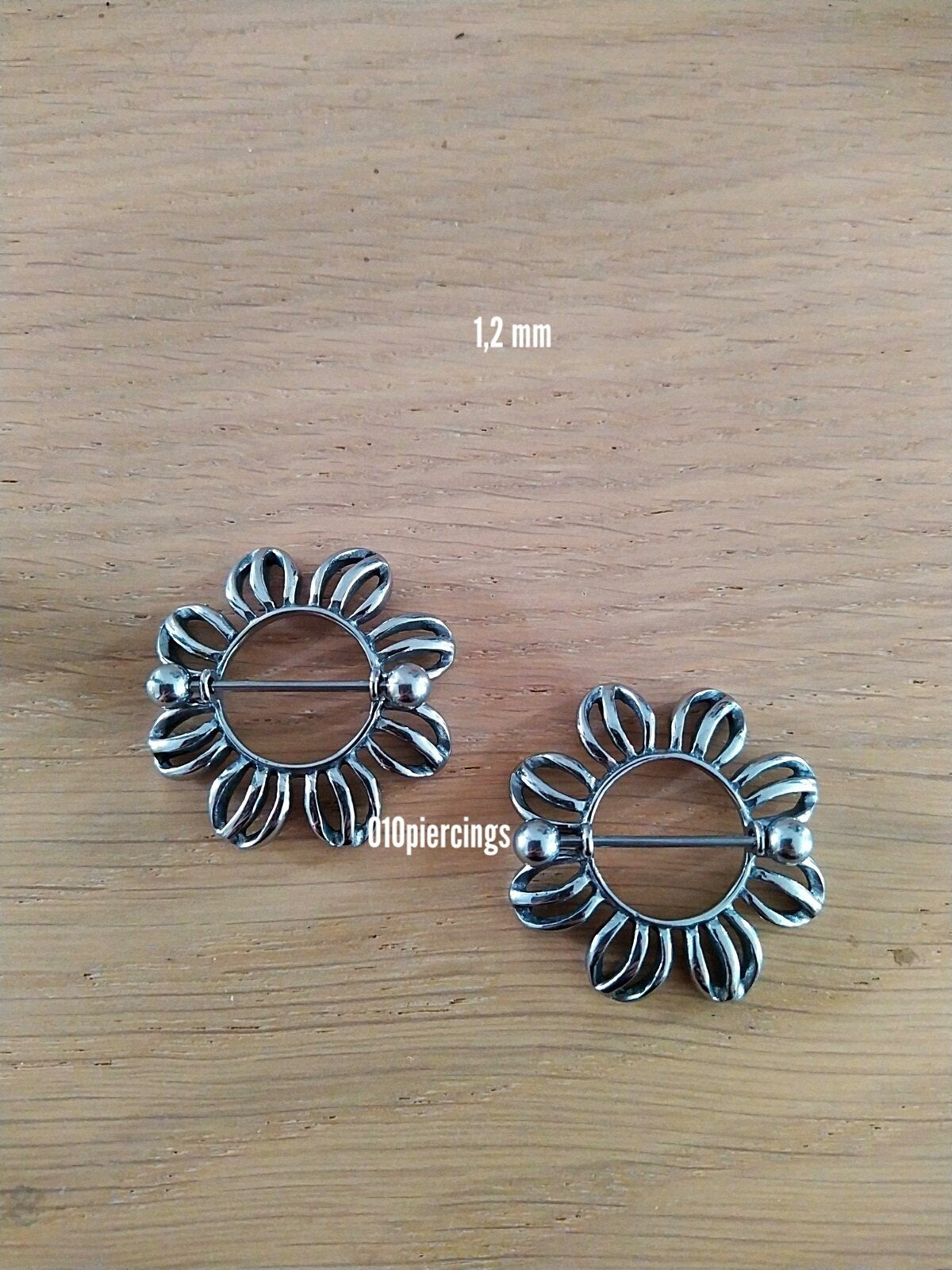 Nieuwe tepelpiercing., Ophalen of Verzenden, Zo goed als nieuw, Staal, Oor- of Traguspiercing